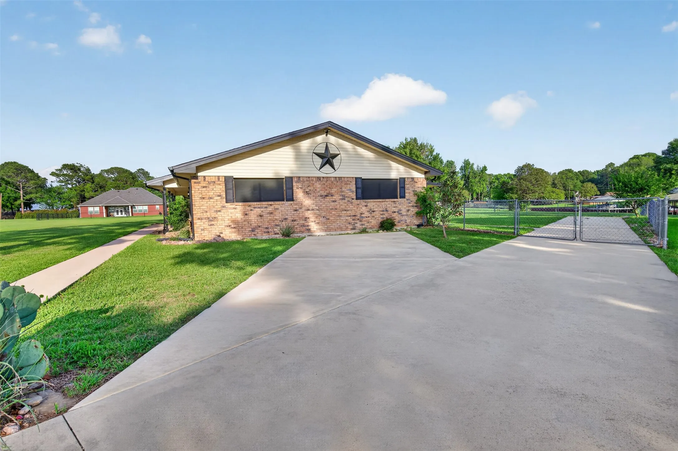 View of the side of the home shows the ample parking