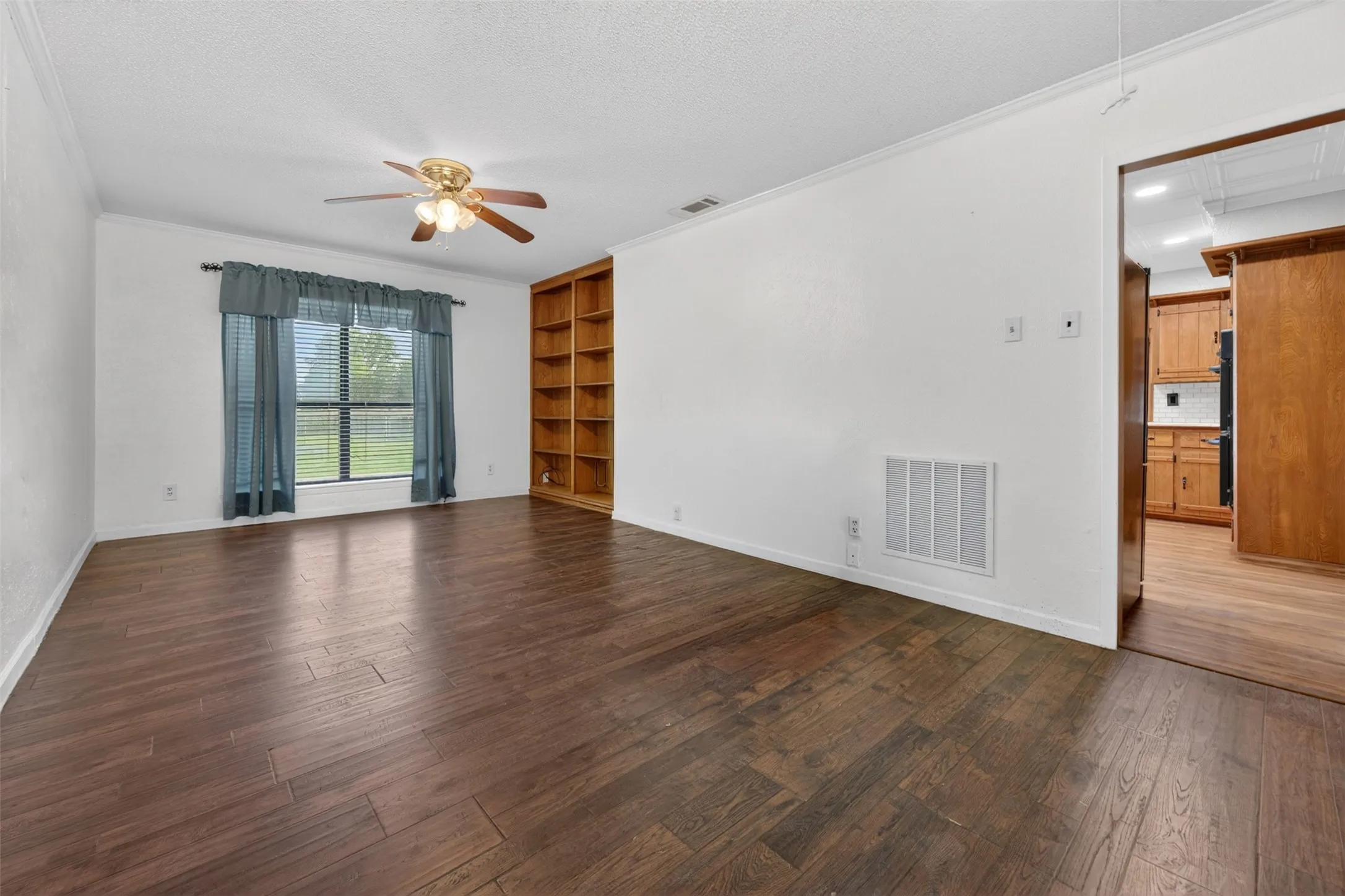 Large room off the kitchen can be used as an office, second living room, media room - you decide!