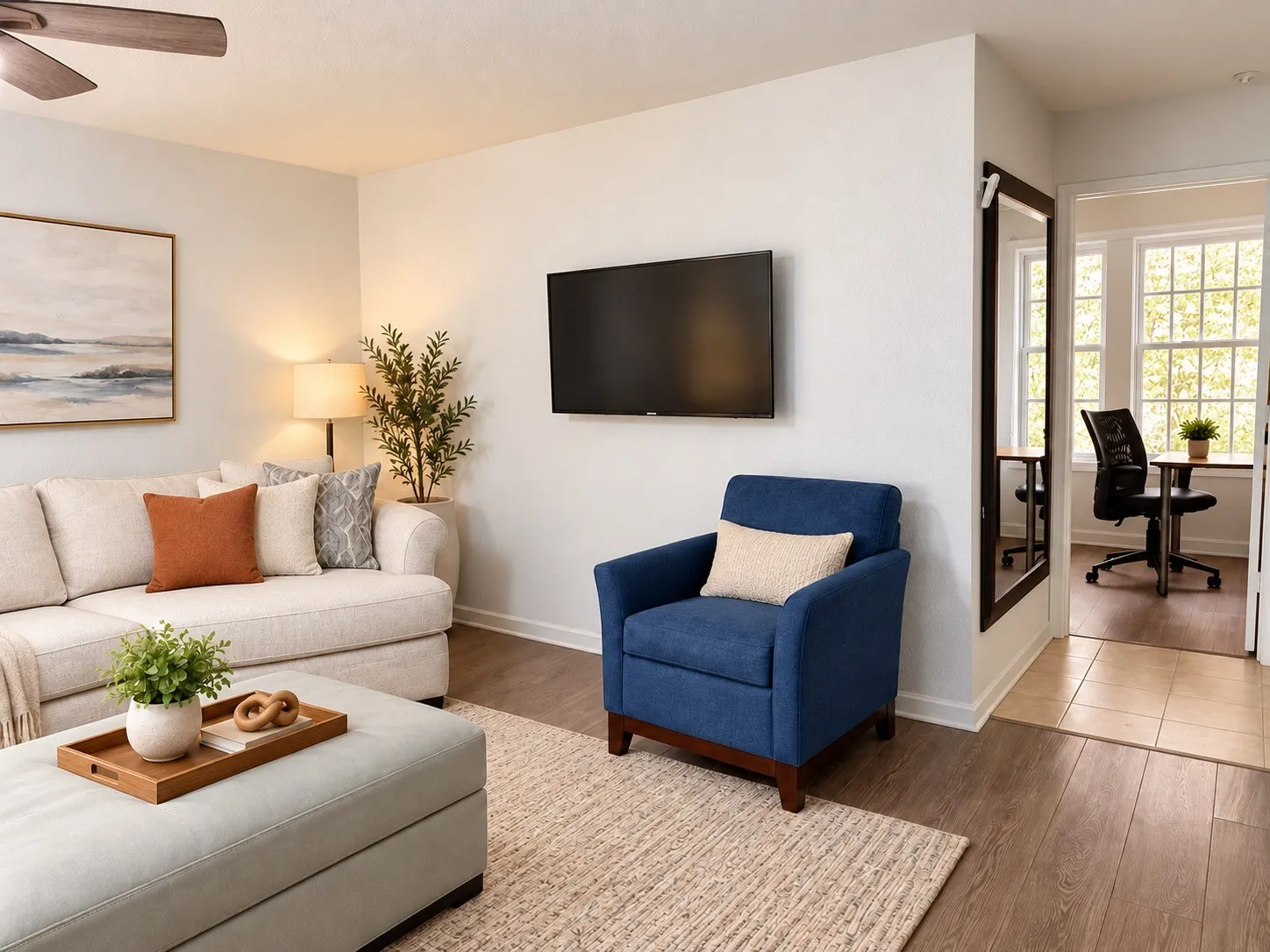 Wood-finish flooring, ceiling fan, and recessed lighting