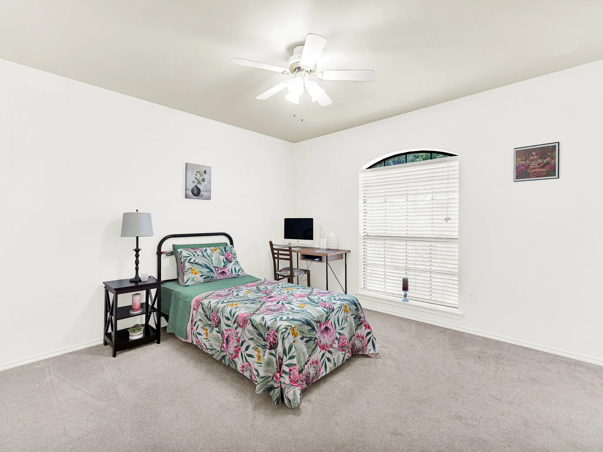 This fresh middle bedroom provides space to play and sleep, such a fun space.