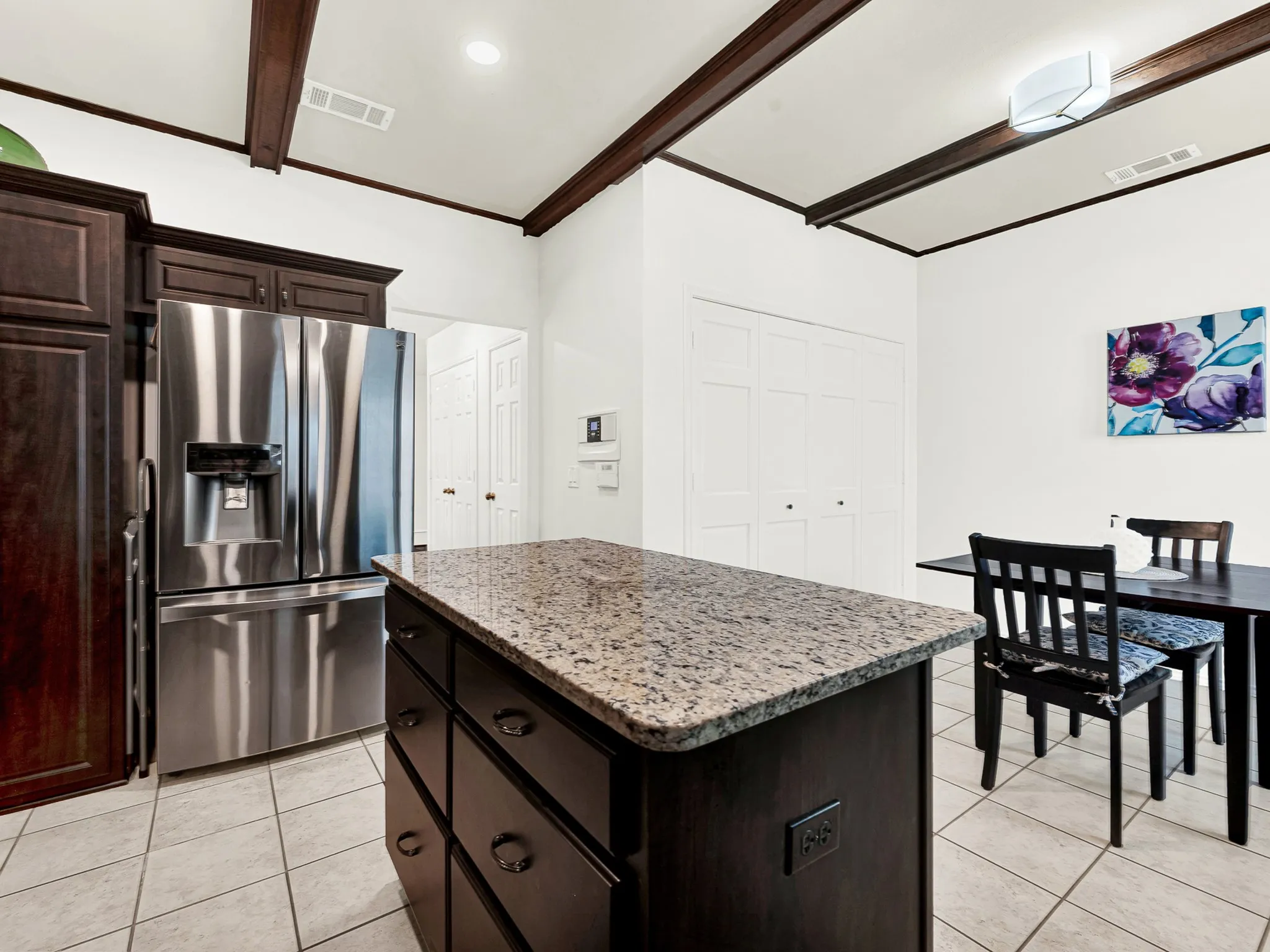 The center island makes prep work a breeze along with the extra storage.