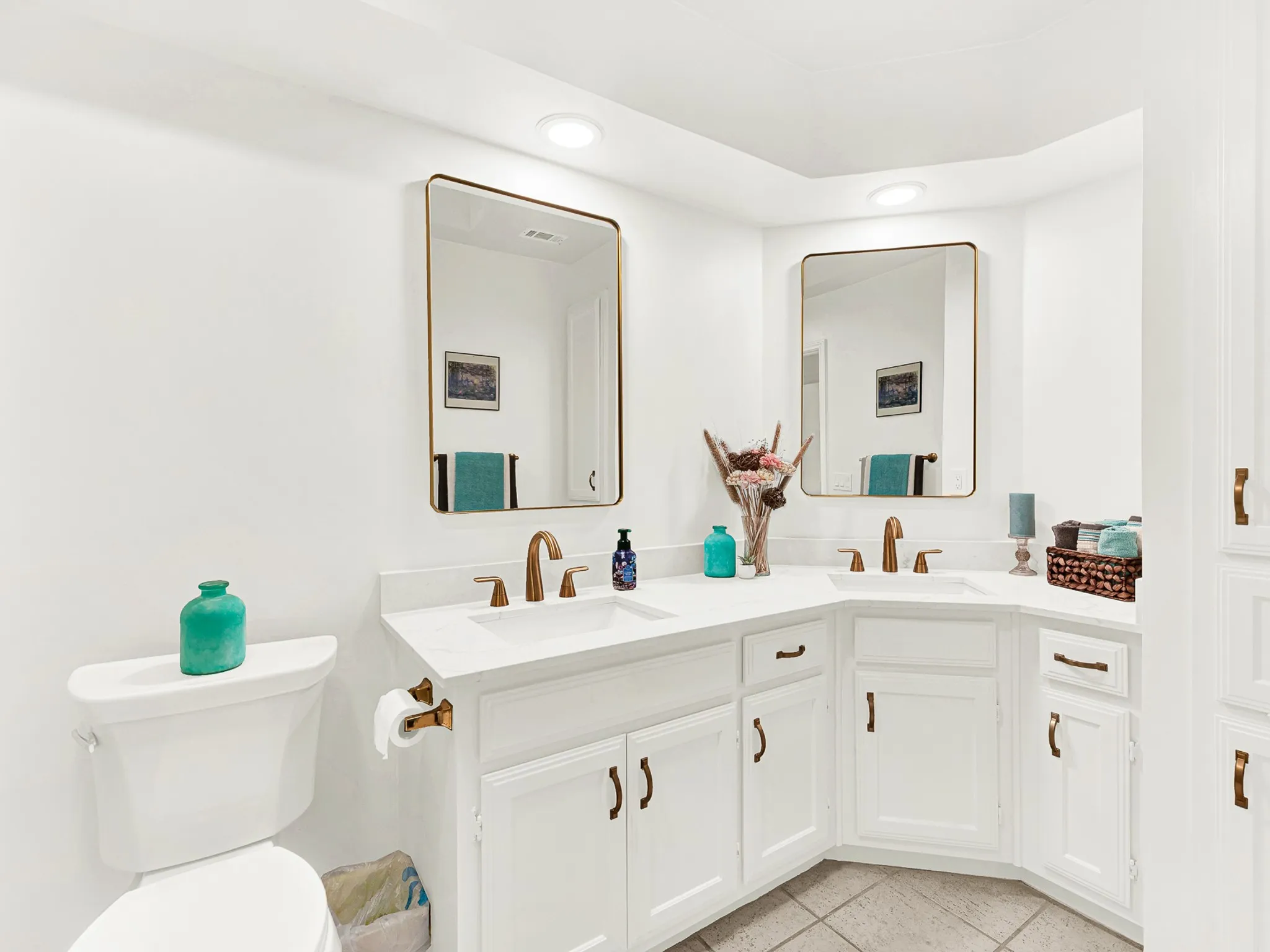 Modern updated guest bathroom with quartz counter tops gives that fresh feel, custom cabinets, tall linen closet, custom shower area, accented with brushed Chroma