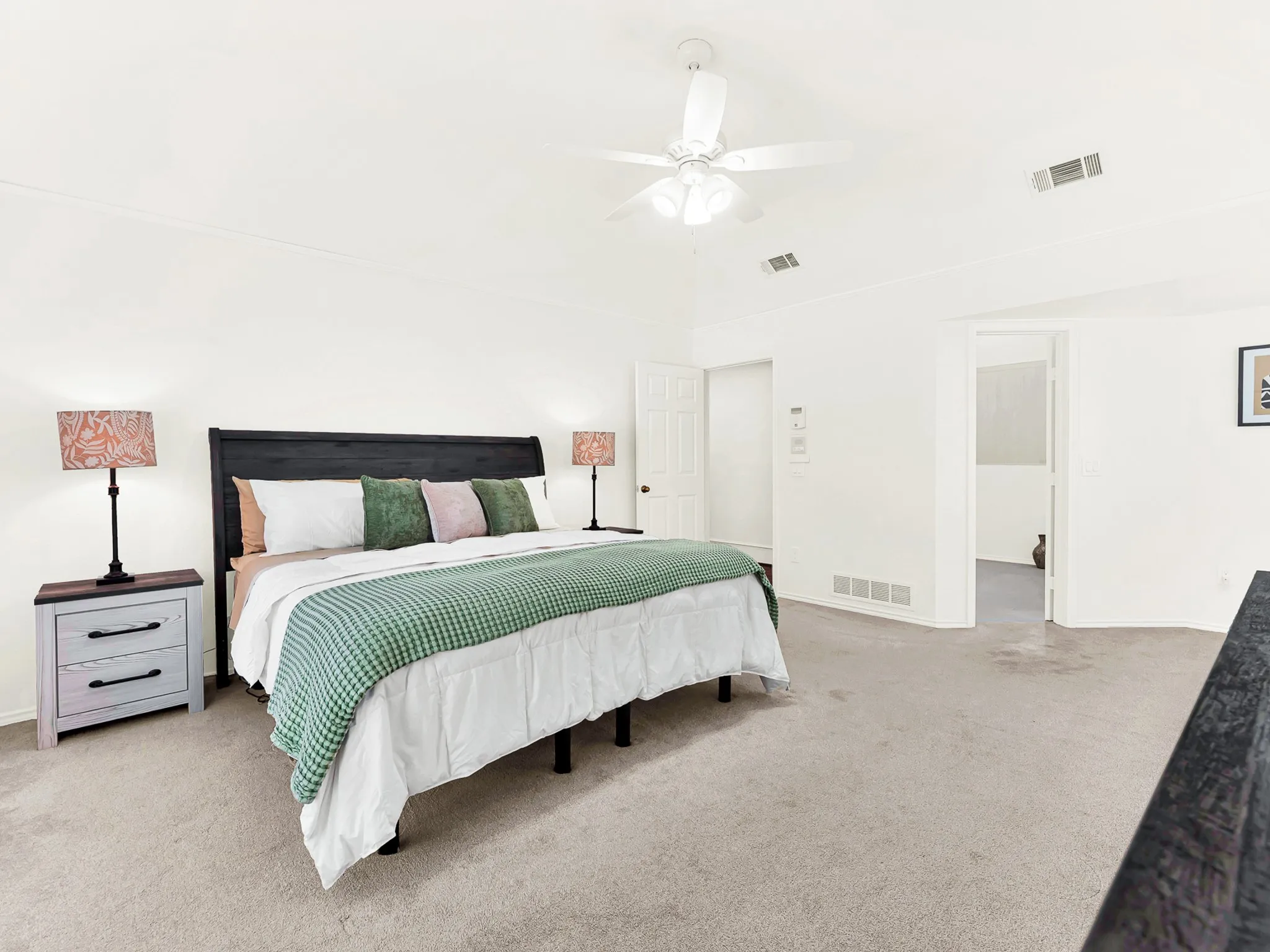 Spending time in the primary suite will be a pleasure, with the over size bedroom space, high airy ceilings