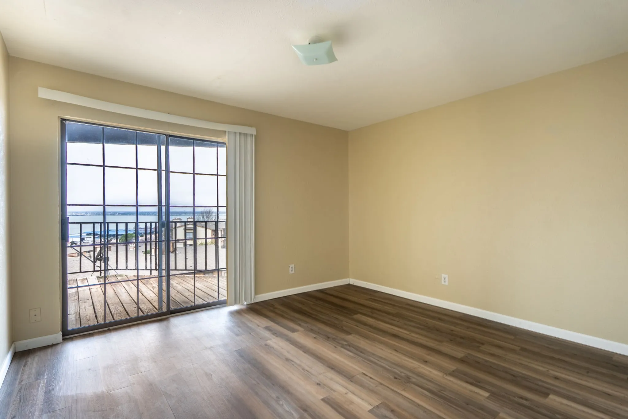 Wood-finish flooring with neutral wall tones