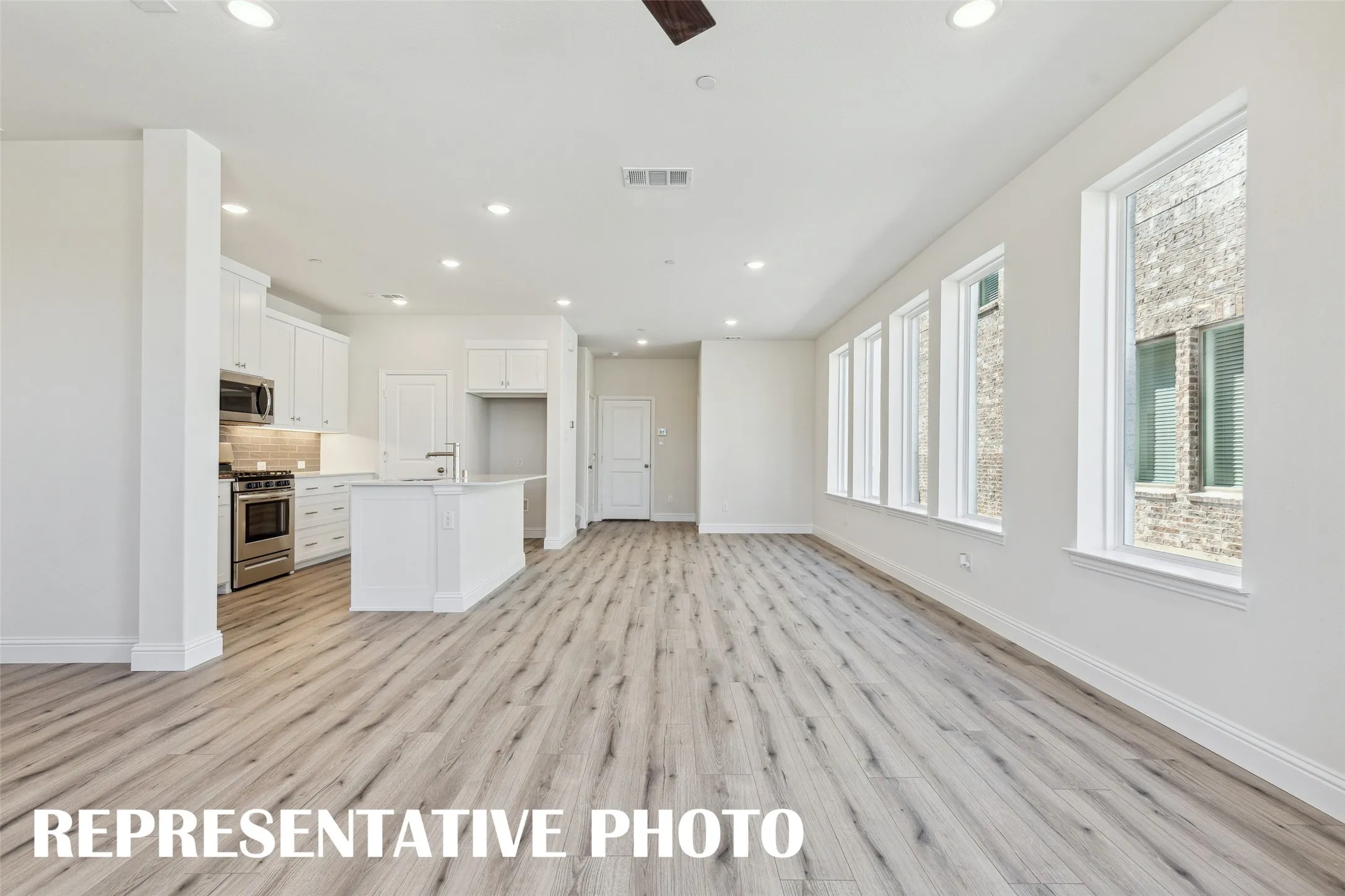 Welcome into your new light filled, open concept dream home!  REPRESENTATIVE PHOTO