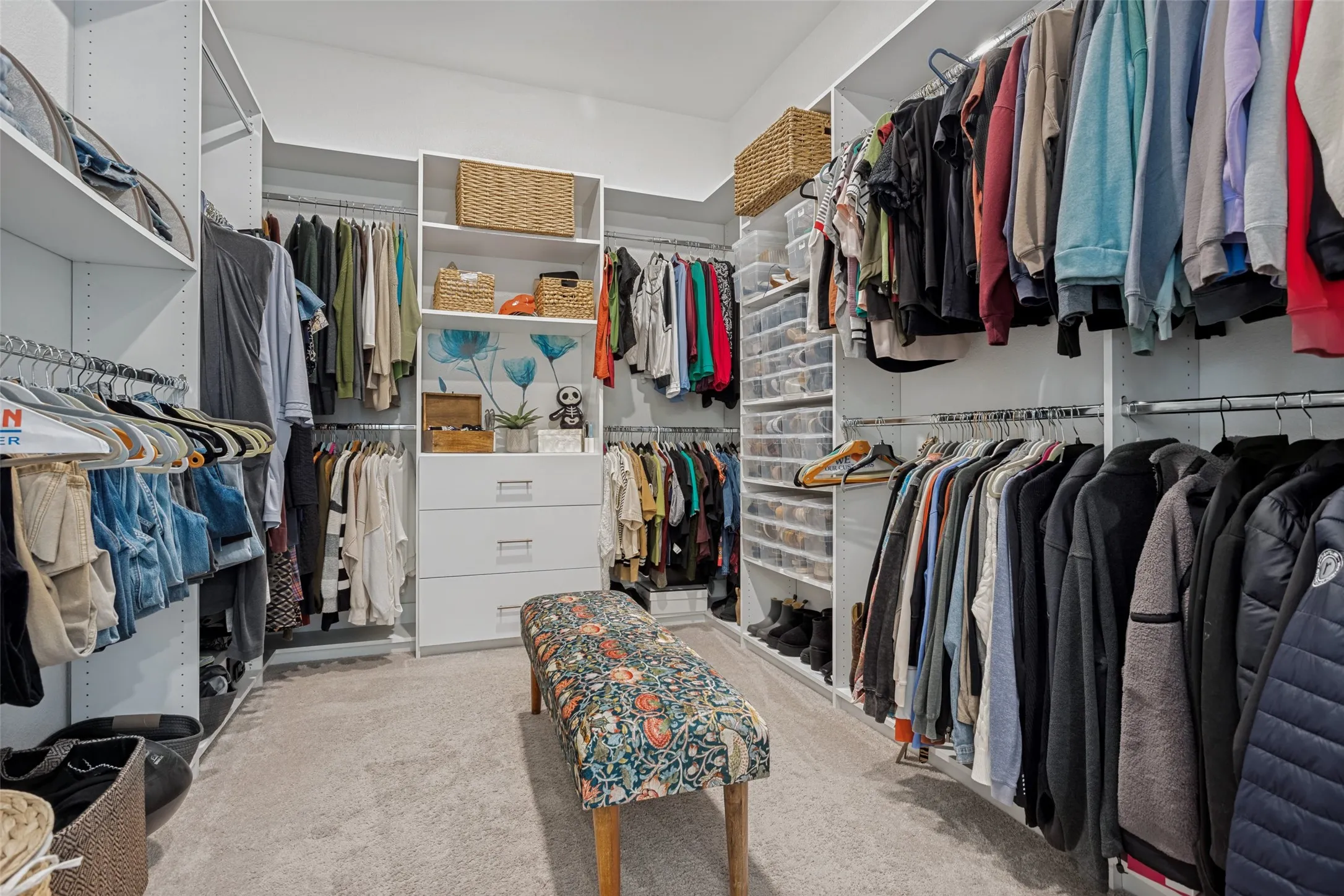 Thoughtfully designed walk-in closet with custom shelving