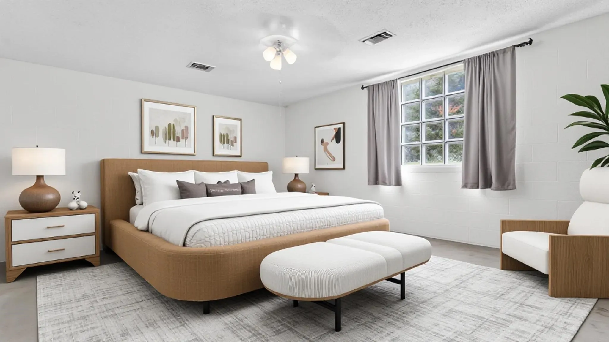 Spacious room featuring light-colored walls and a multi-pane window