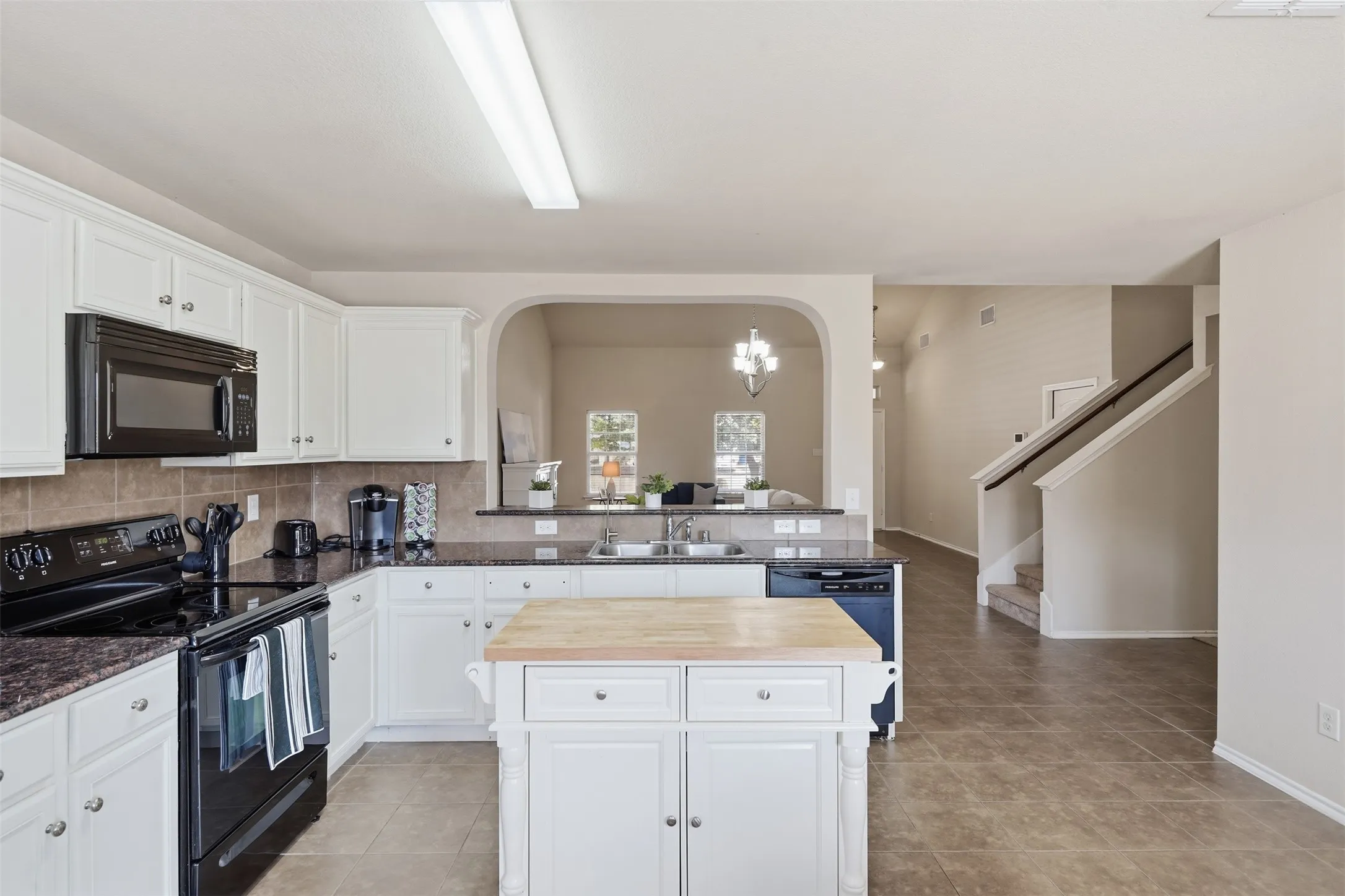 The dedicated dining area provides plenty of space for family dinners, entertaining guests, and holiday gatherings