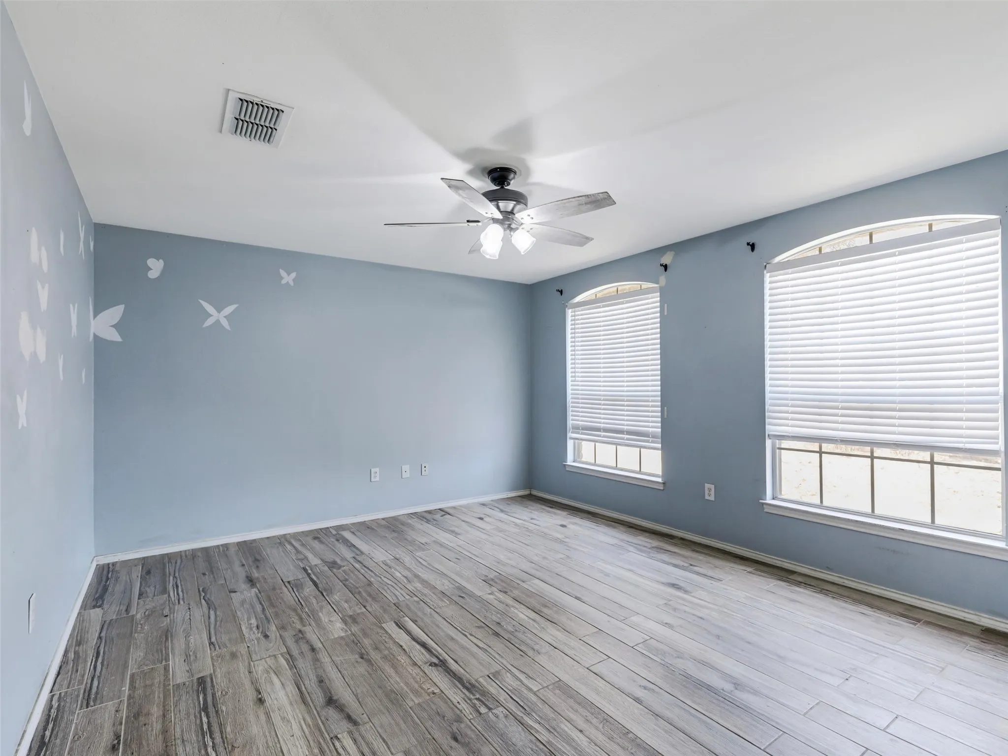 Wood-finish plank flooring throughout