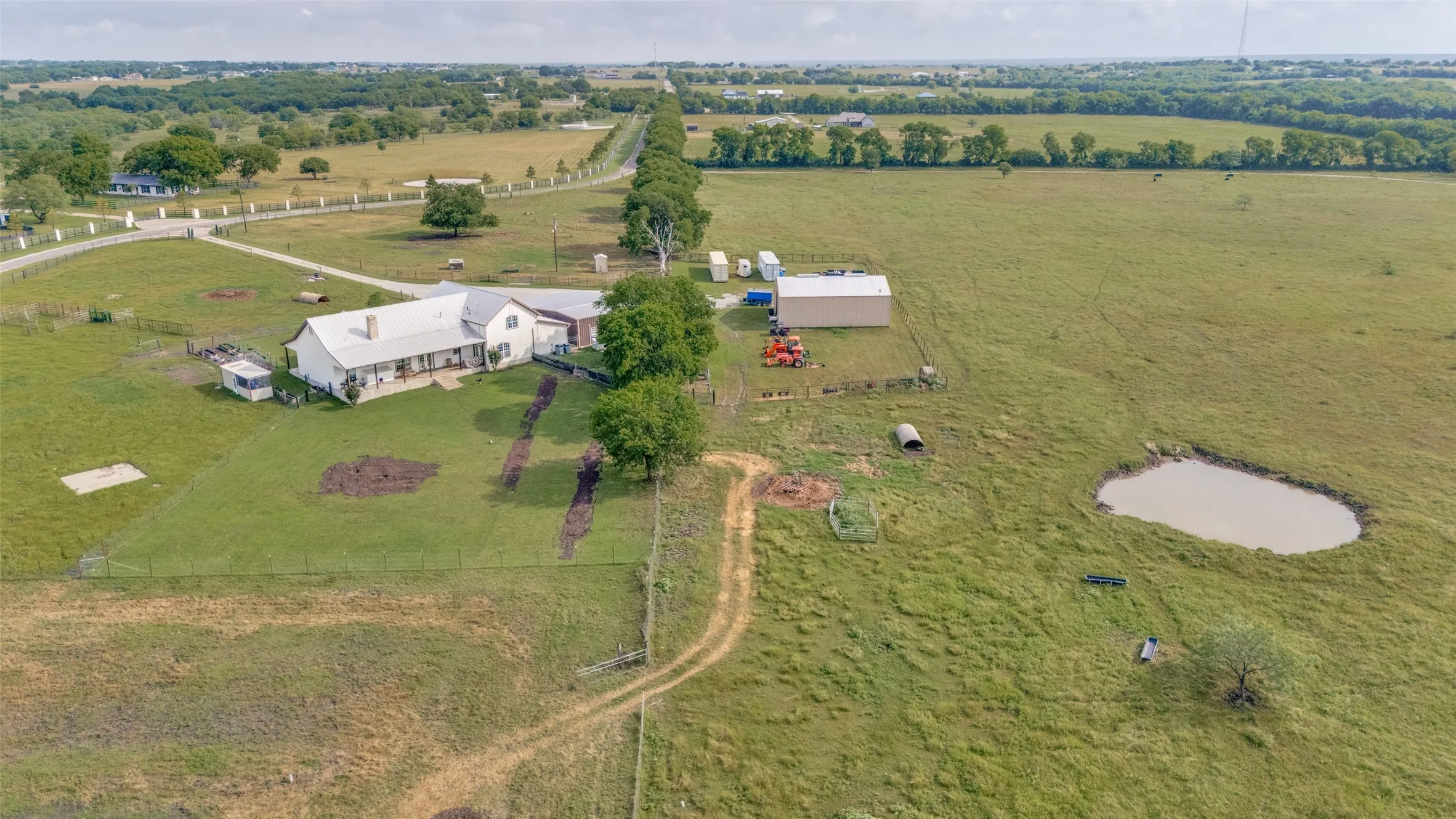 Back of house, shop & front pond.