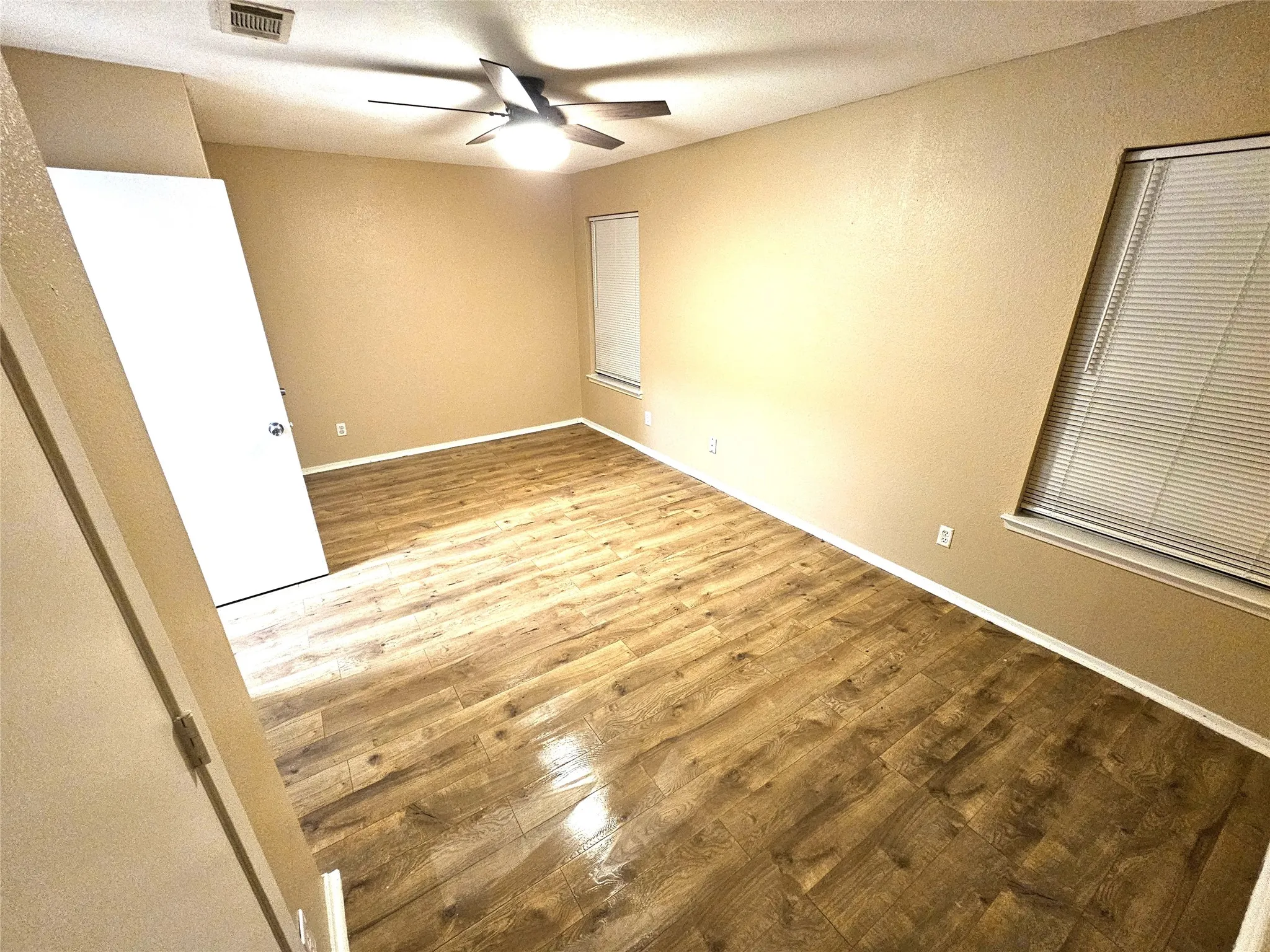 Bedroom#2-Another good size bedroom (13x13) with new ceiling fan & new wood laminate floor. And with double closets as well. (unit D)
