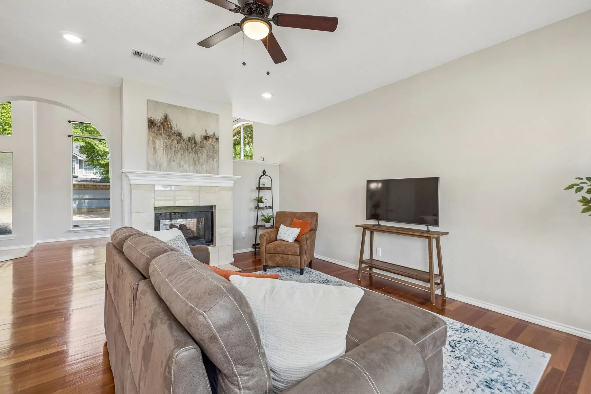 Generous second living area shares see through fireplace.