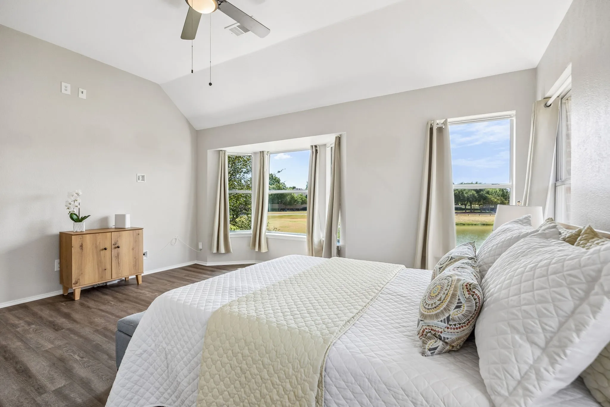 Plenty of room for large bedroom furniture and sitting area in this spacious primary bedroom