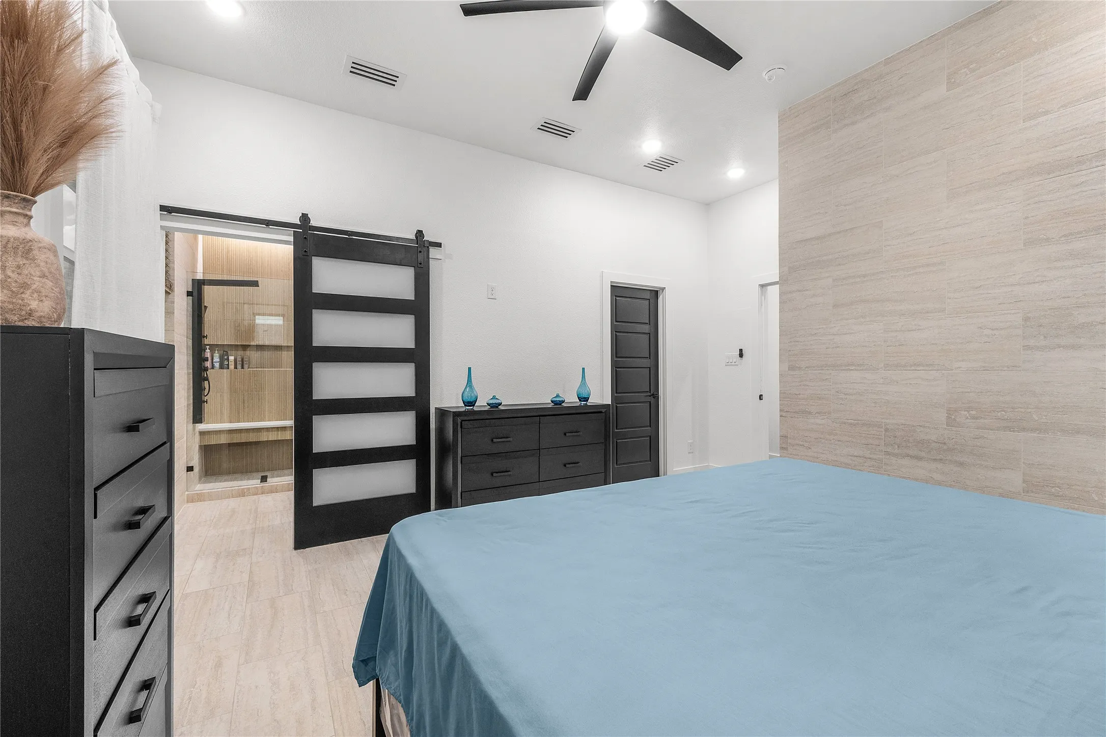 Wood-finish flooring with a barn door entry