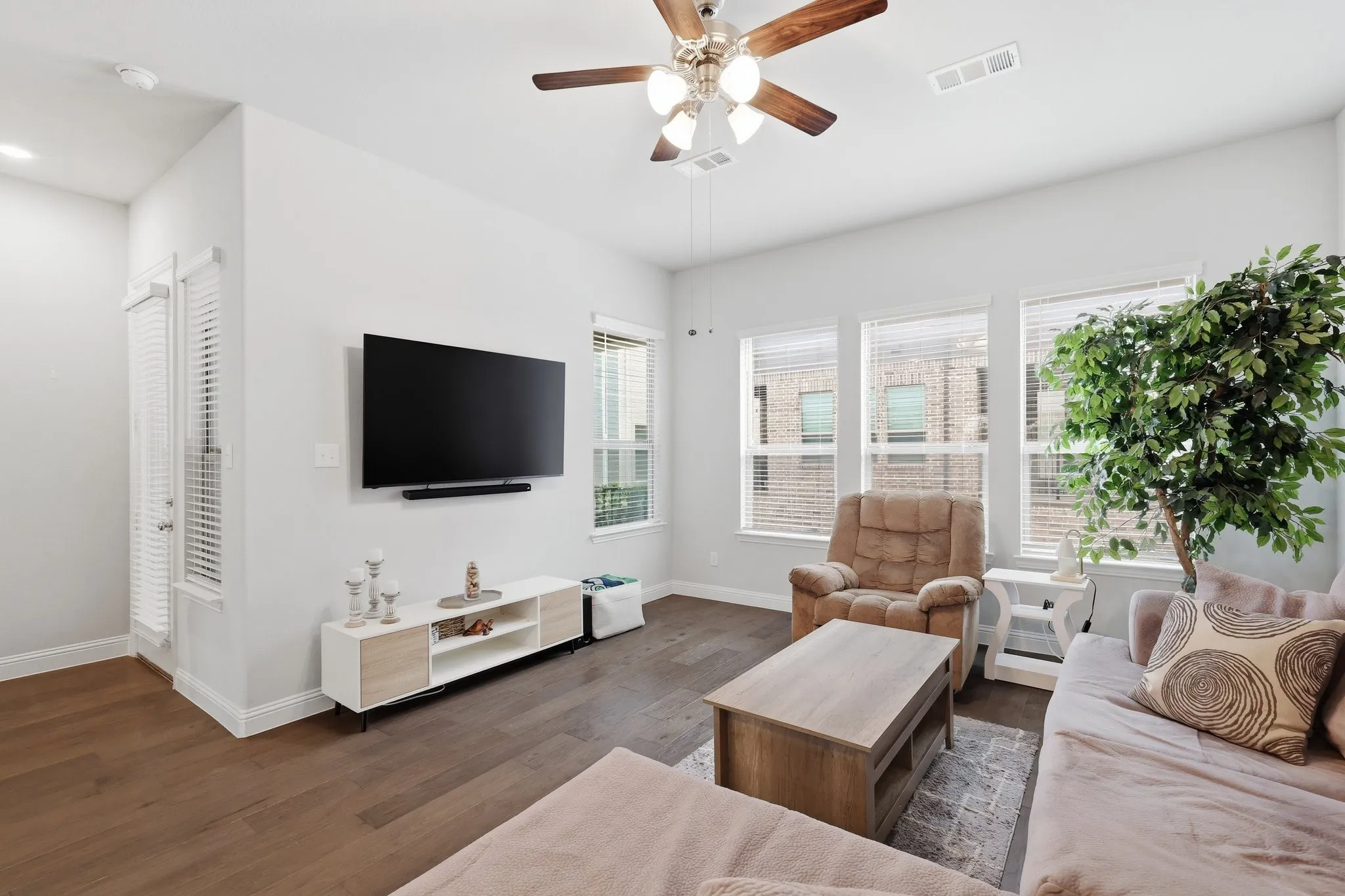 Oh My! The Family Room in this space is so flexible! You can arrange any decor style to work! So bright and airy!