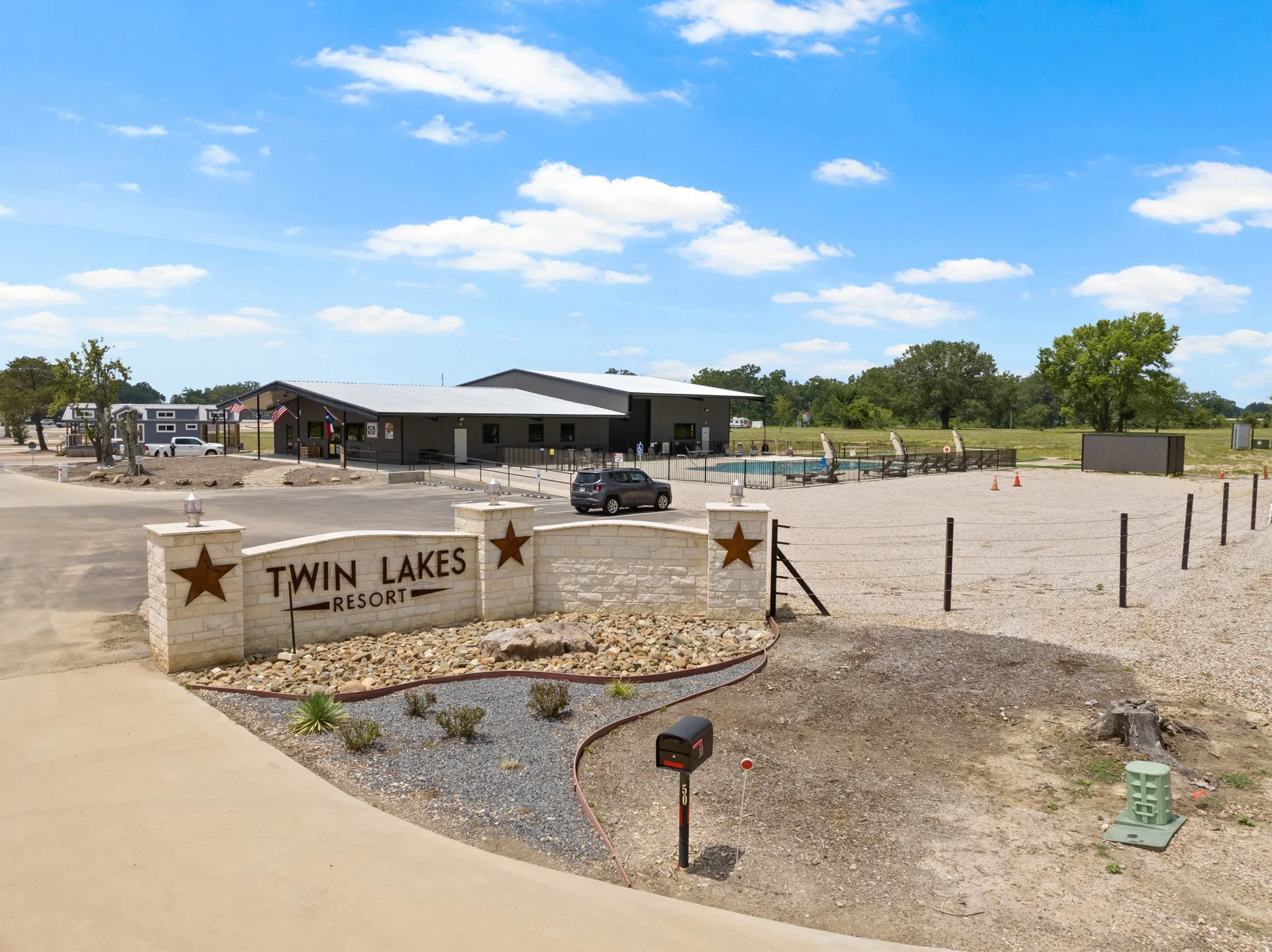 View of property's community featuring a swimming pool