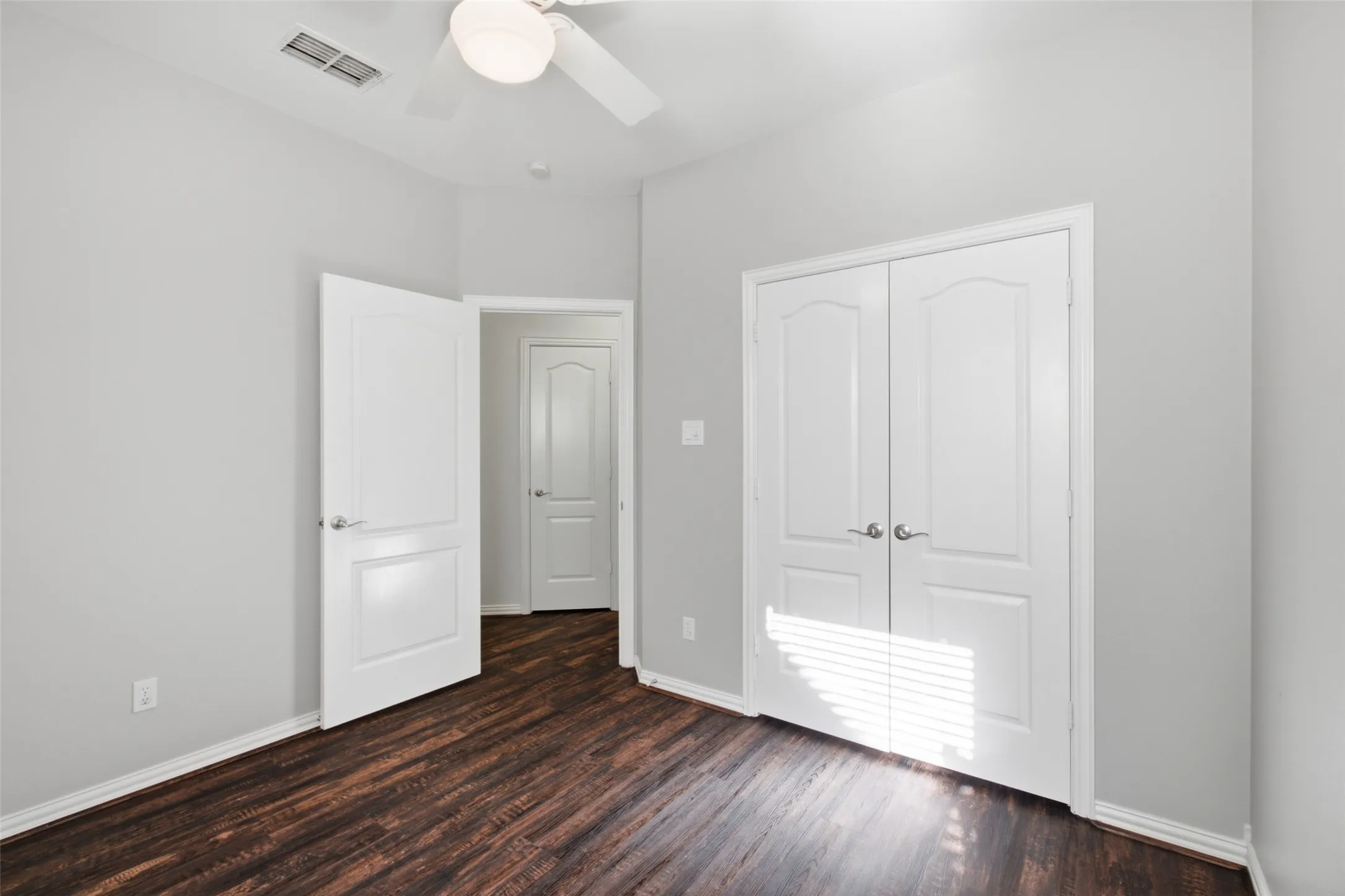 Bright secondary bedroom on the opposite wing