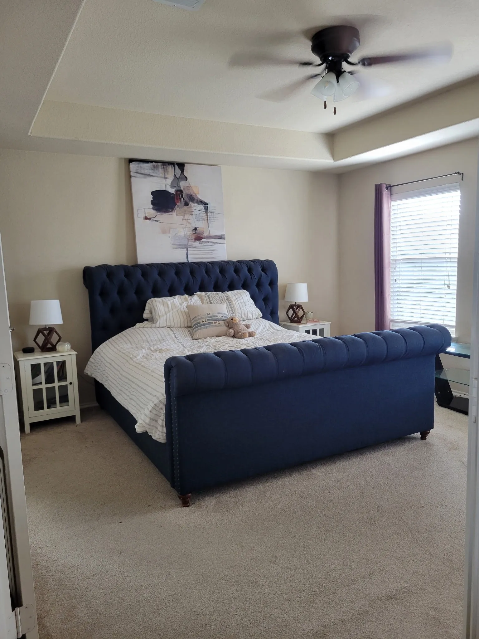 Recessed ceiling detail and wall-to-wall carpeting