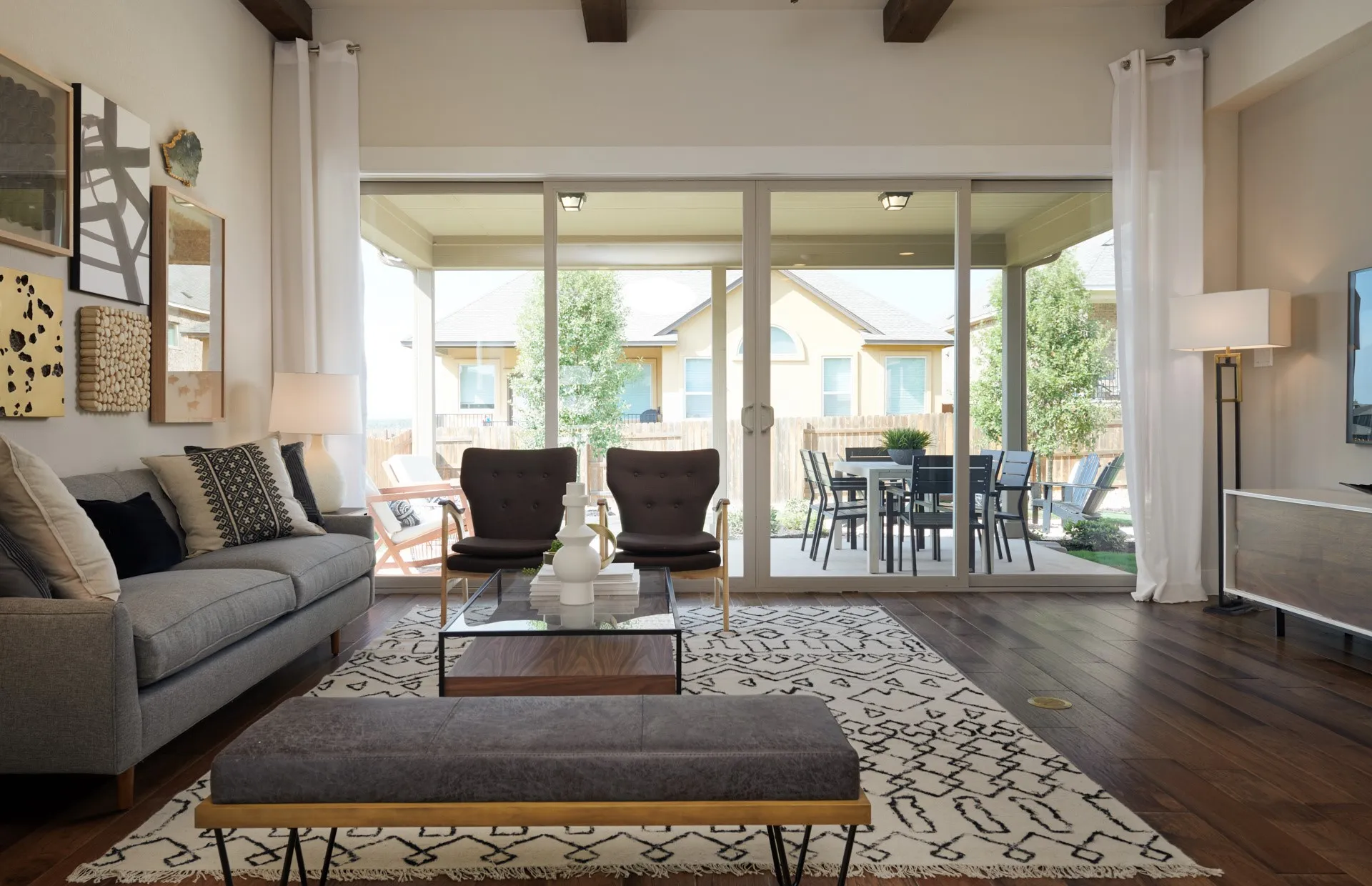 *Model Representation - Spacious gathering room with large windows