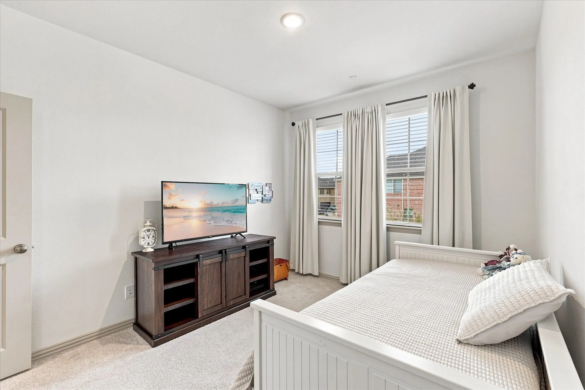 Guest bedroom features split design for both owner and guests privacy.