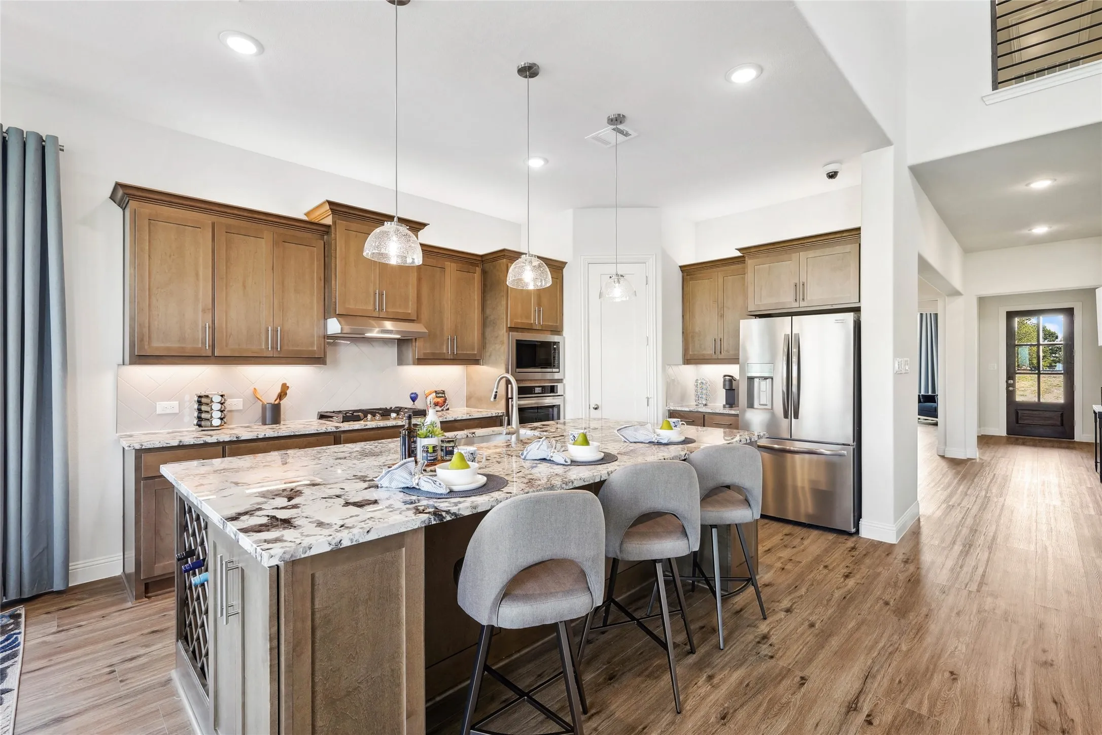 Model home photos of similar floorplans, not pictures of actual home.
