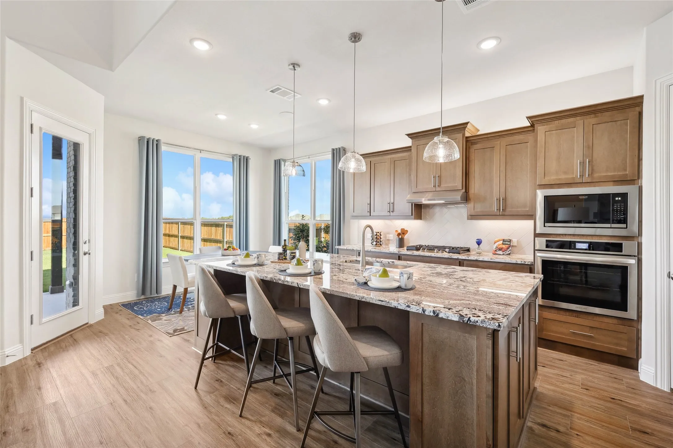 Model home photos of similar floorplans, not pictures of actual home.

