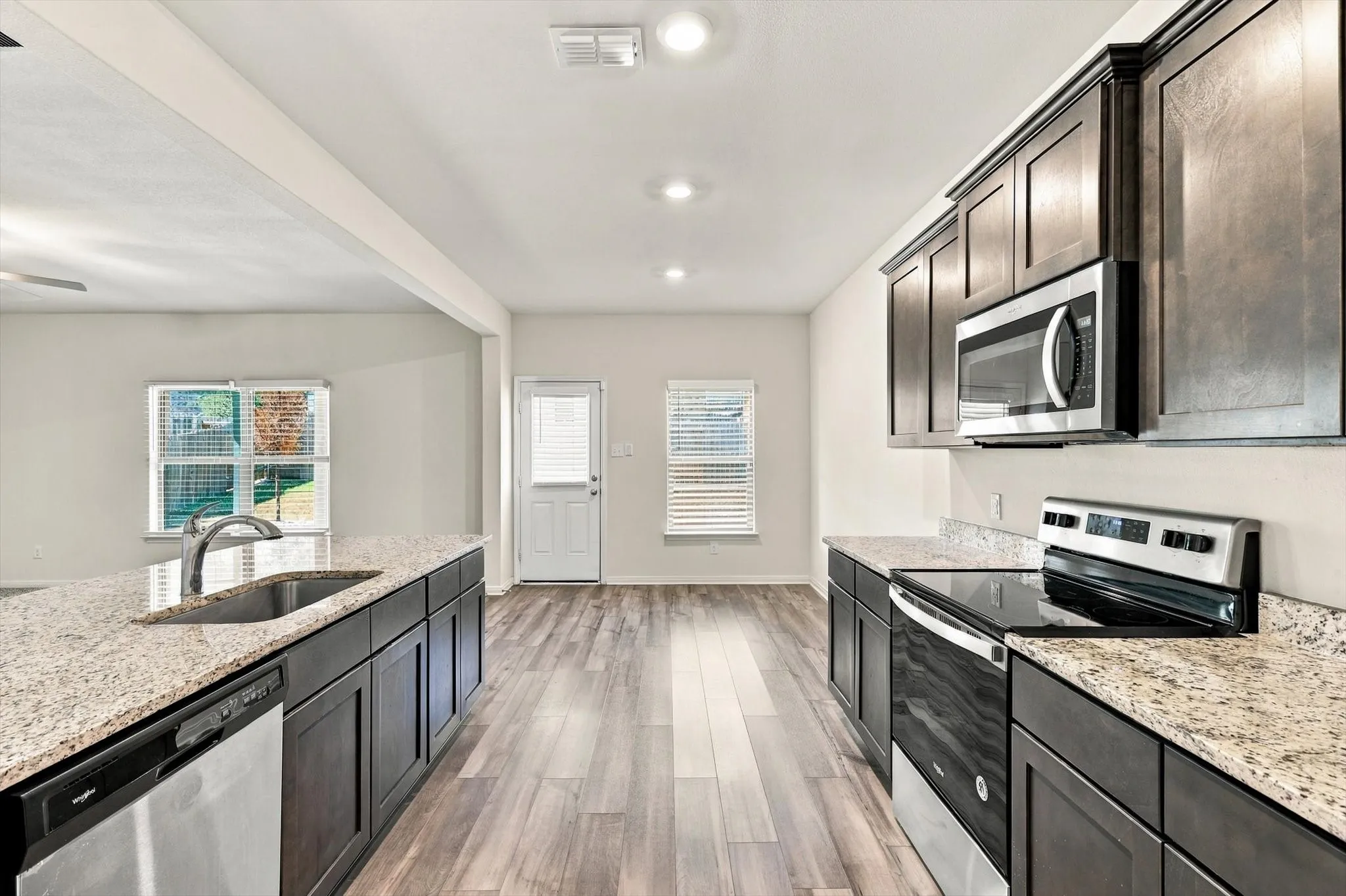 Beautiful stainless steel appliances in all electric kitchen