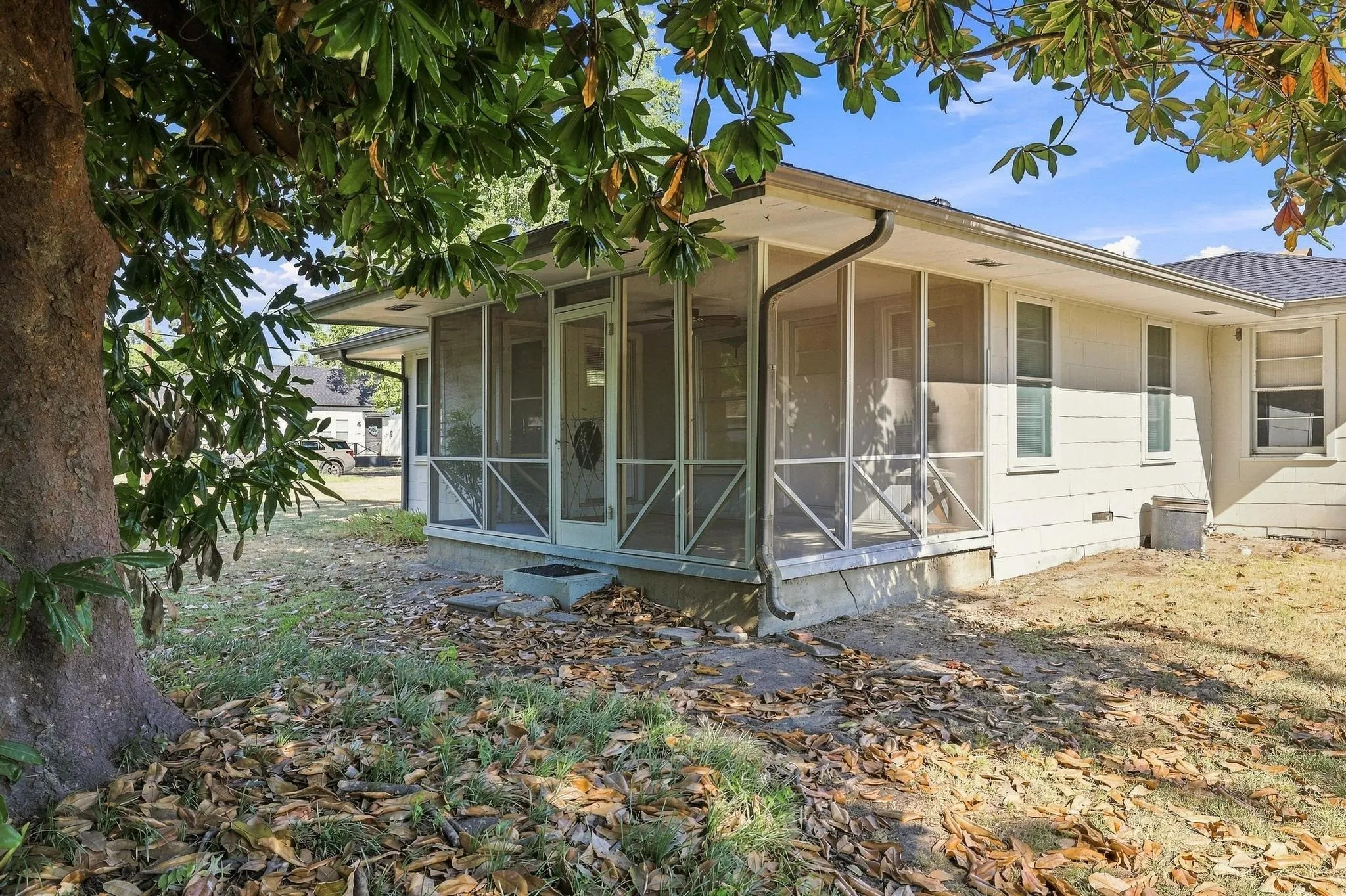 Screened porch with concrete foundation and direct exterior access.