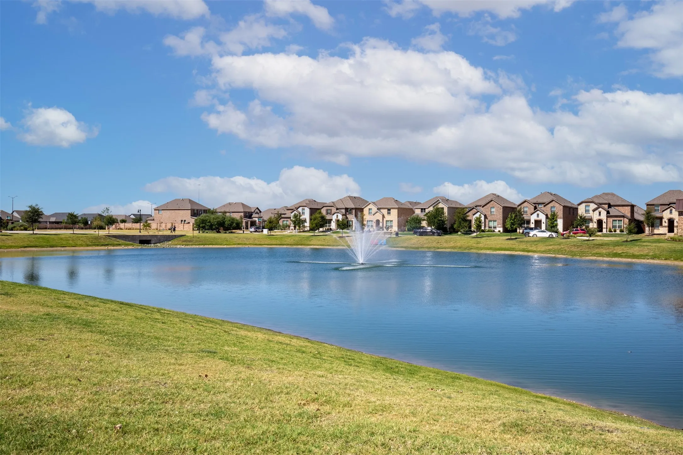 Expansive body of water featuring a central fountain
