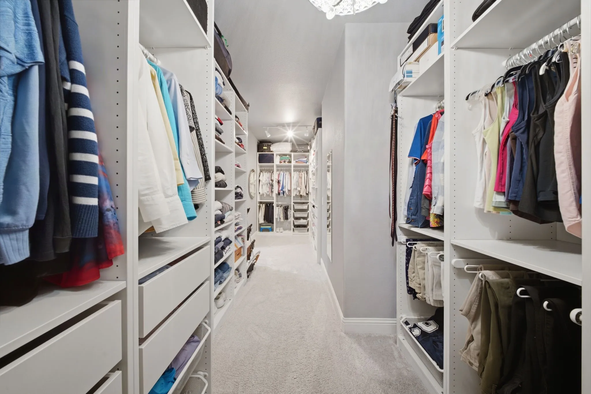 Primary walk in closet! Amazing built ins!
