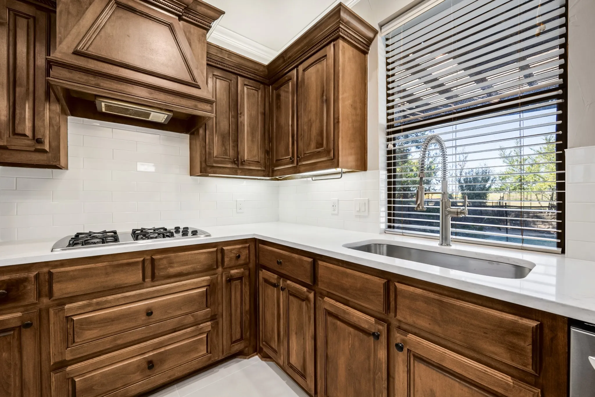Look out at your outdoor oasis while you wash dishes!
