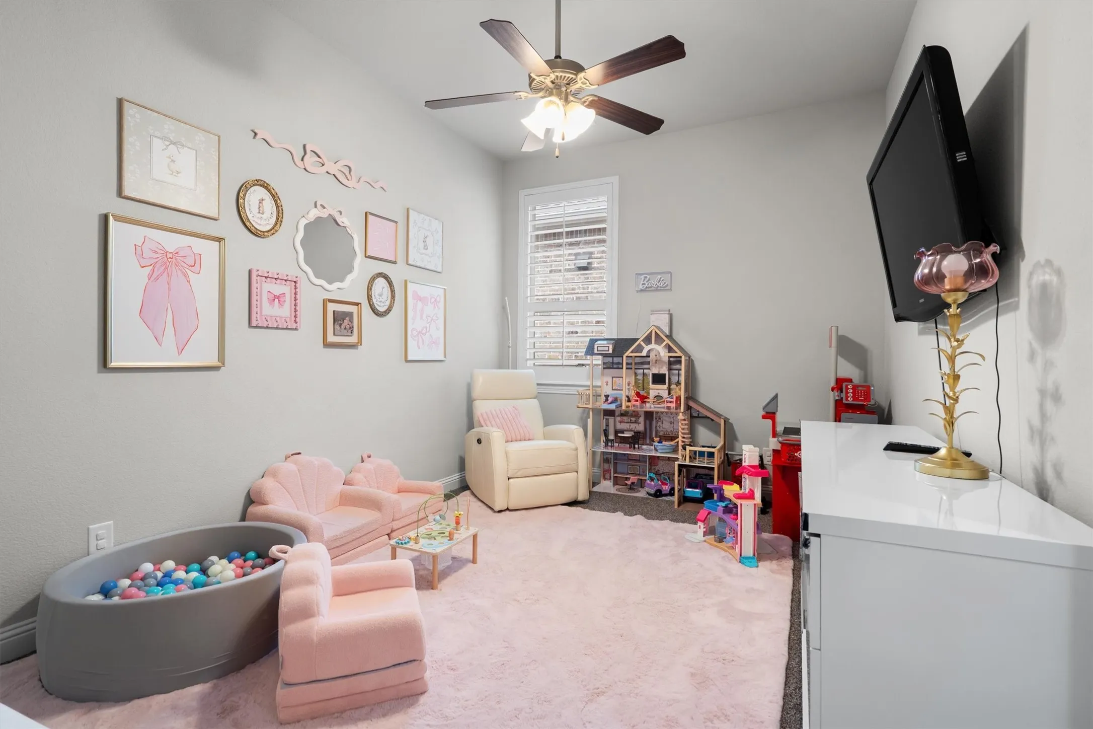  A bright, carpeted flex space perfect as a playroom, hobby room, or additional lounge.