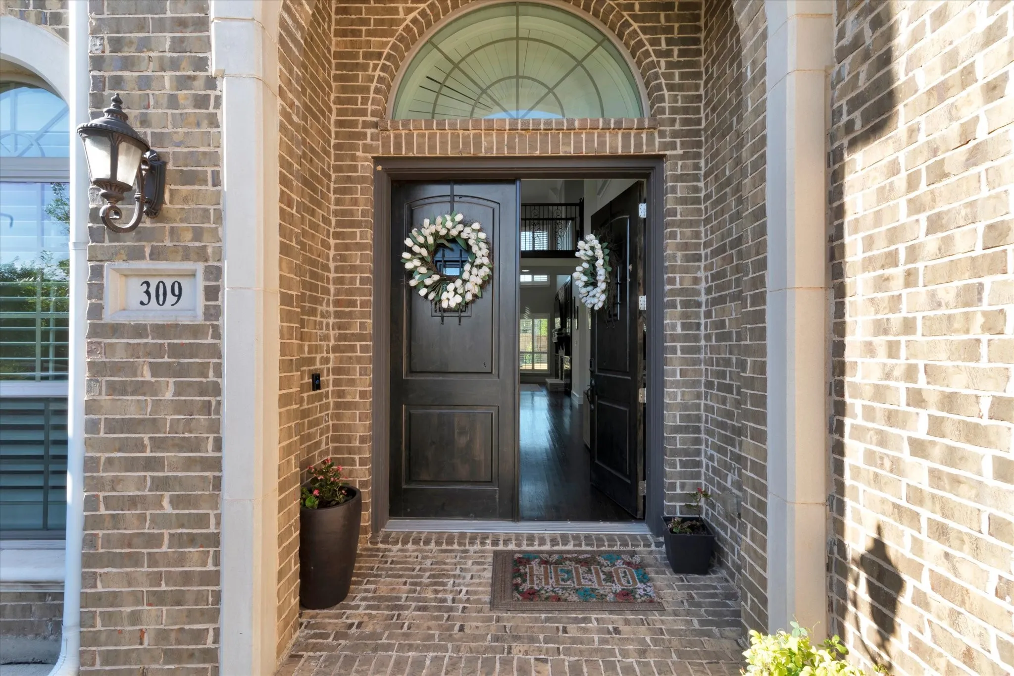 Brick exterior facade with stone accents