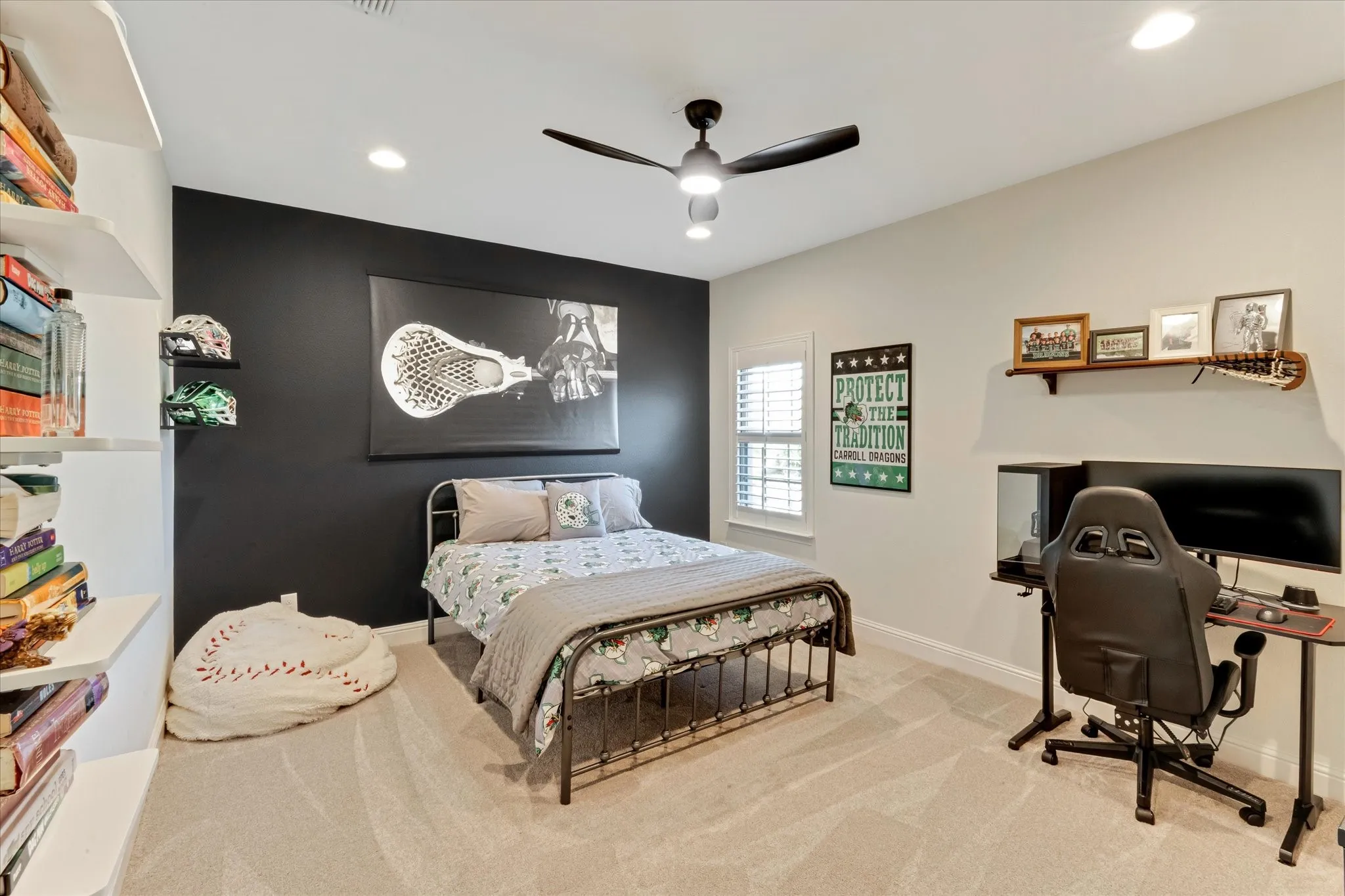 Built-in shelving, recessed lighting, and a ceiling fan with light fixture