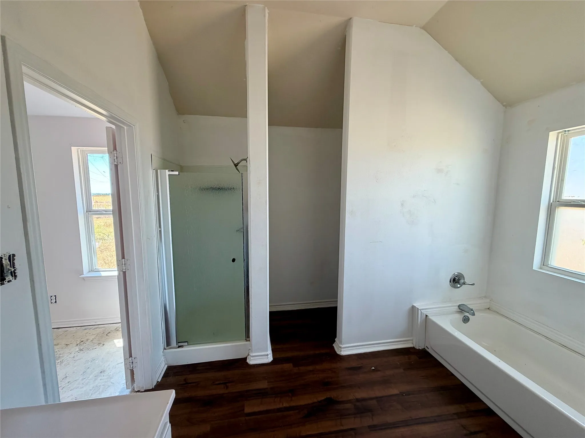 Separate tub and shower.