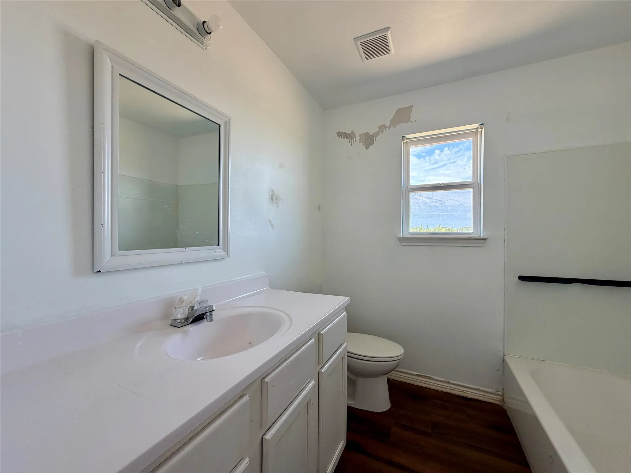 Guest bath with spacious counter top.