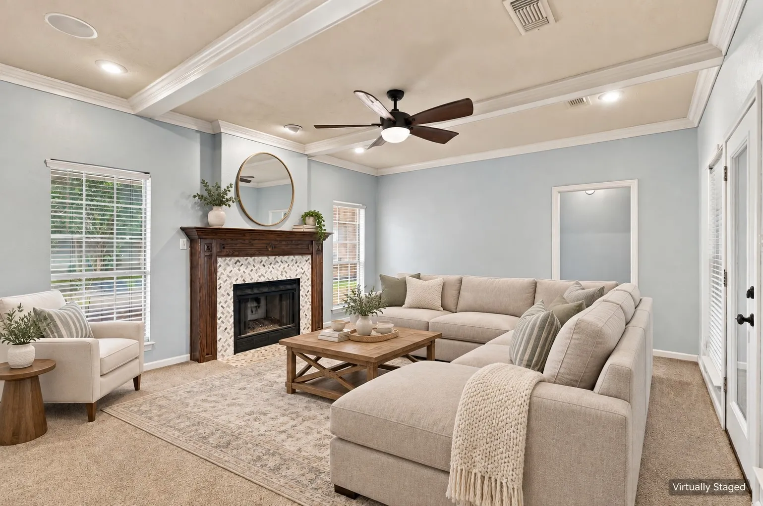 Tray ceiling with recessed lighting and crown molding
