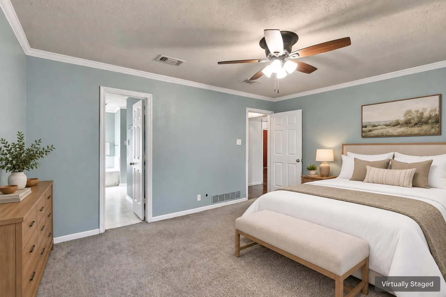 Plush carpeting, crown molding, and a ceiling fan with integrated lighting