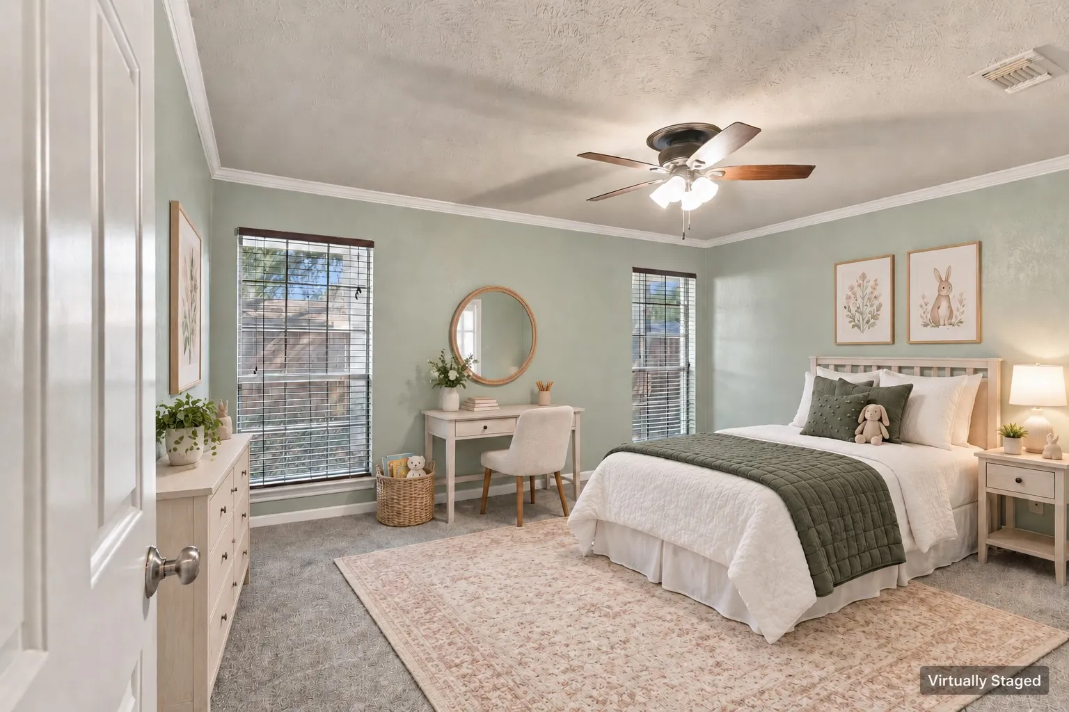 Textured wall finish, ceiling fan, crown molding, two windows with blinds, and carpeting