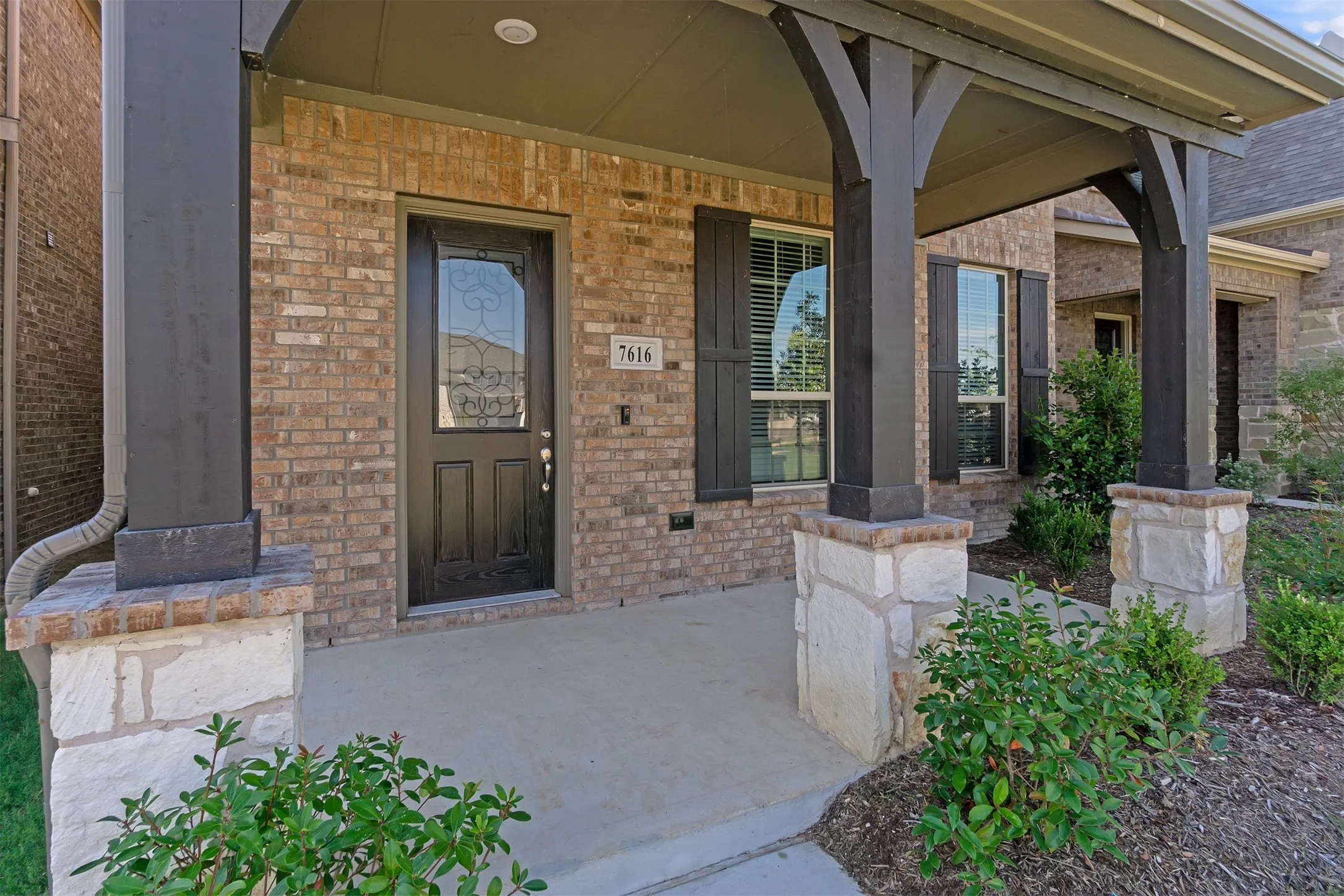 Covered porch adds charm to this home's curb appeal!