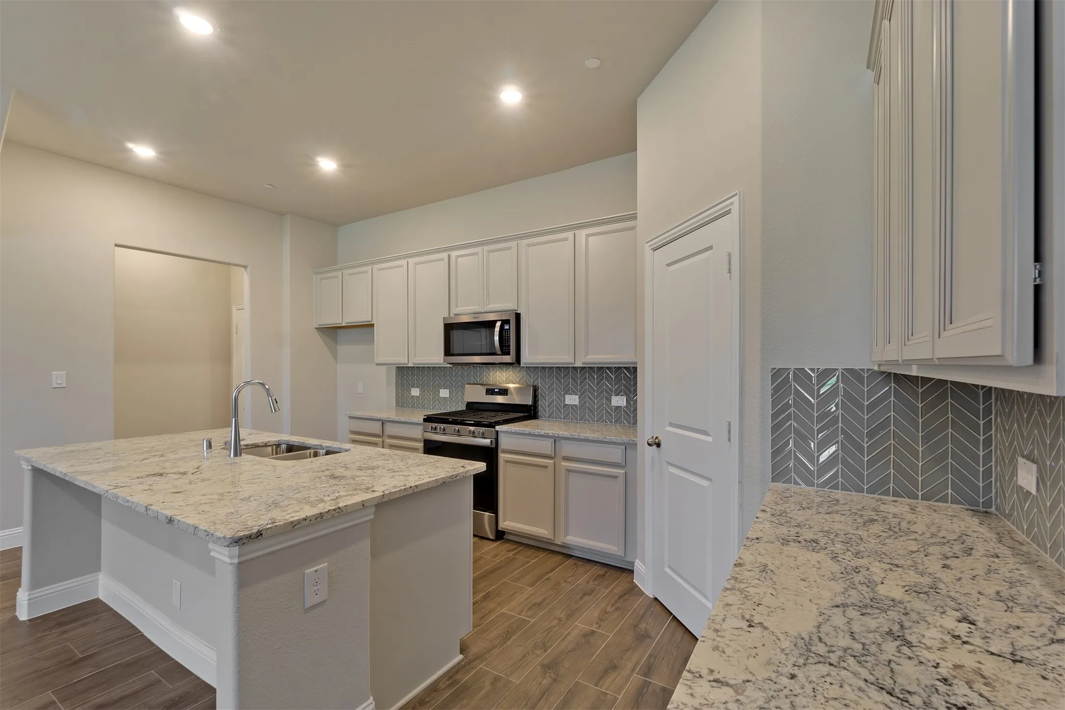 Built in appliances include range, microwave and dishwasher.