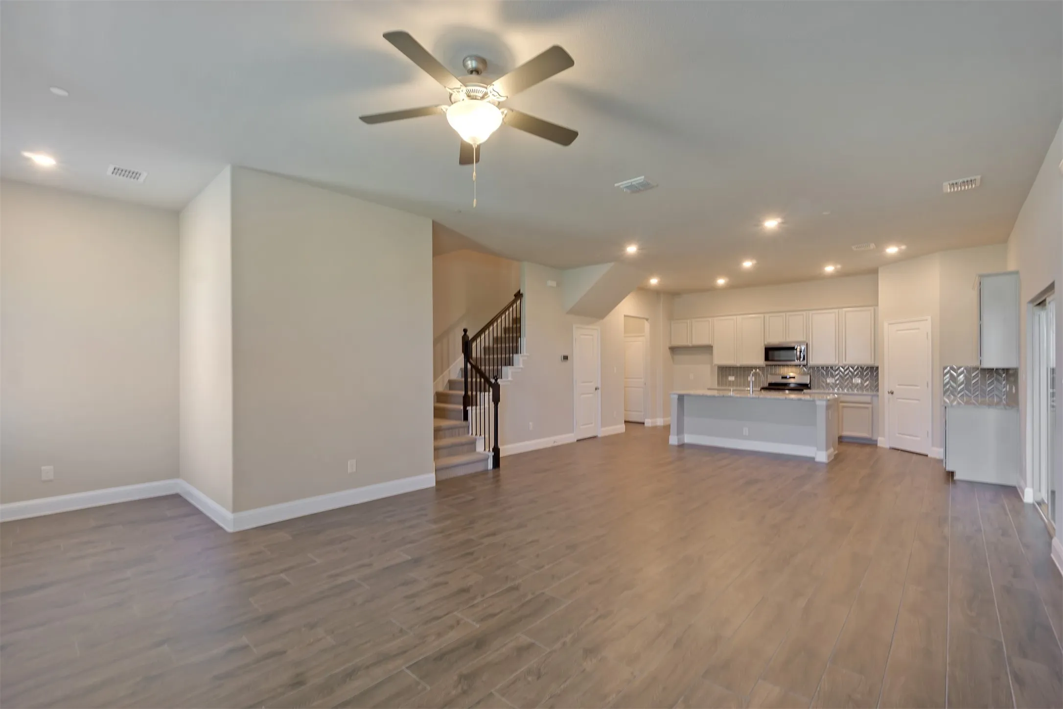 Family room overlooks dining area and kitchen.
