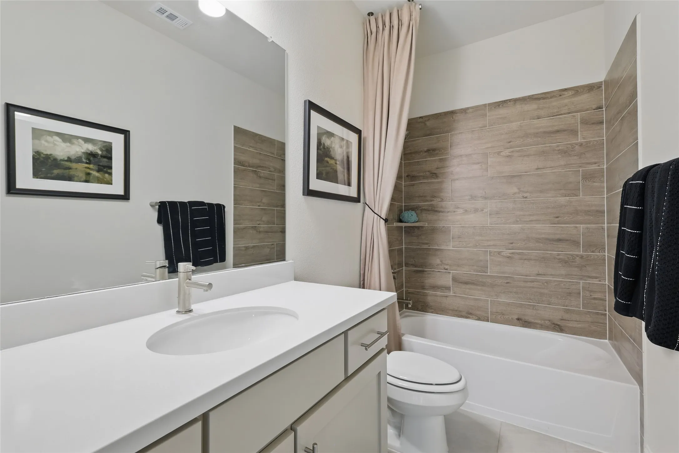 Model home photos of similar floorplans, not pictures of actual home.
