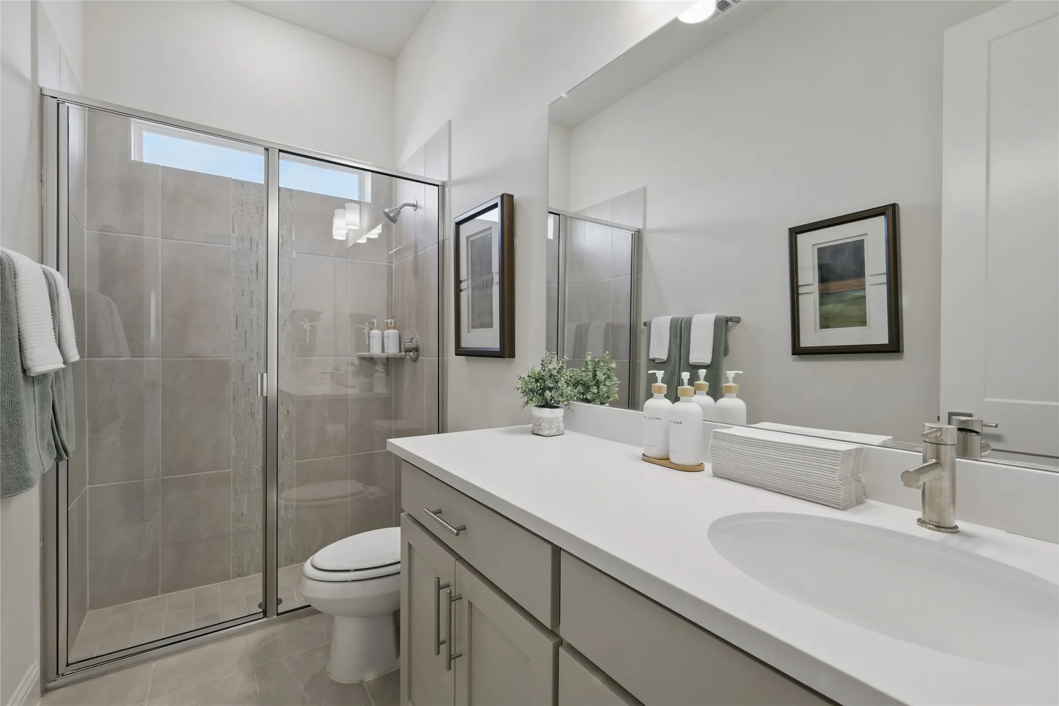 Model home photos of similar floorplans, not pictures of actual home.

