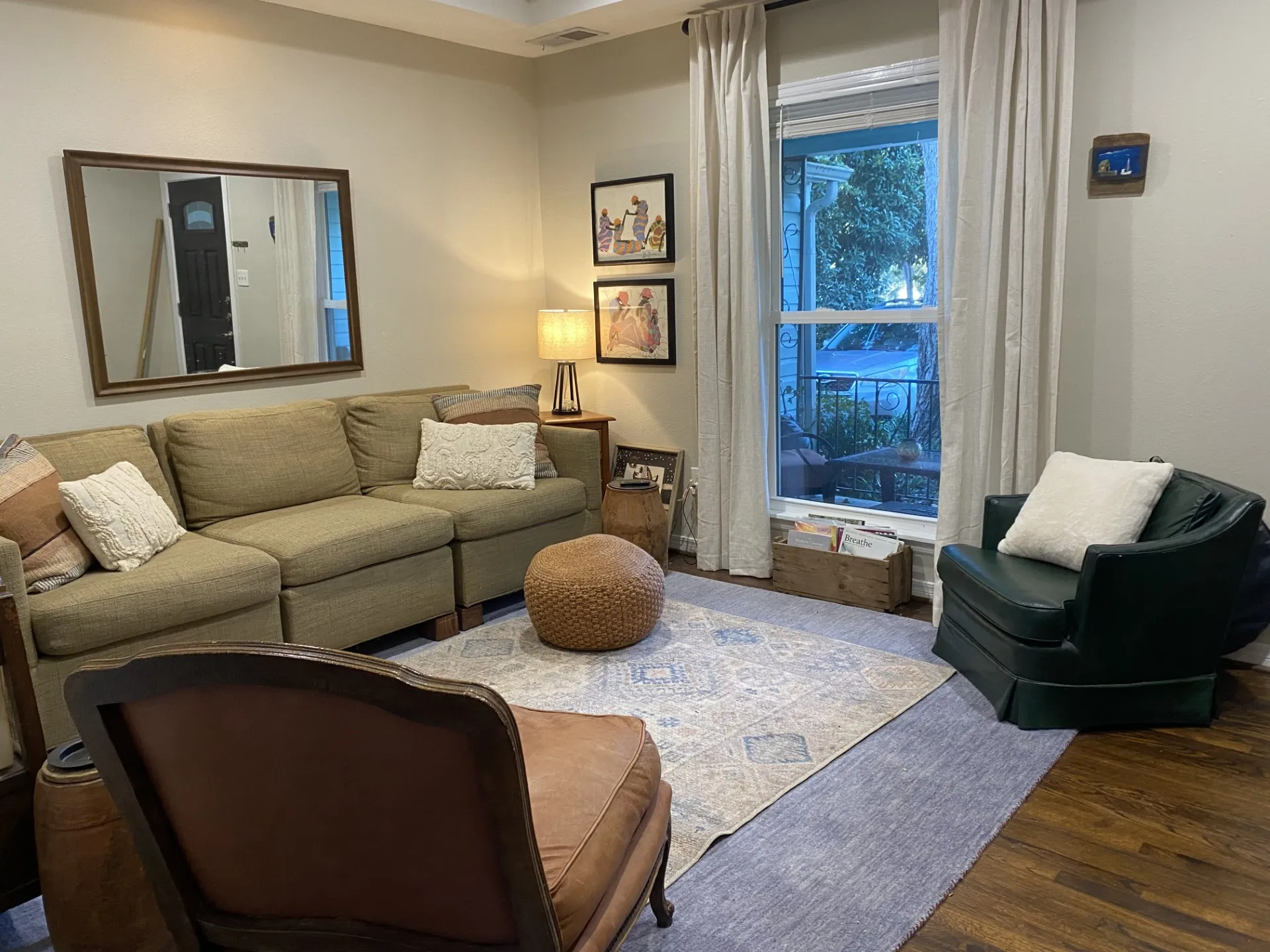 Hardwood flooring and light-toned walls create a bright interior