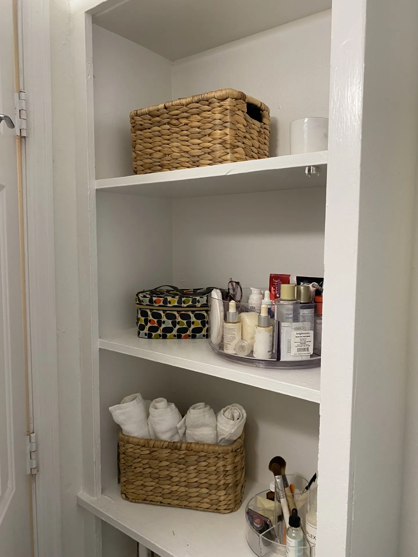 Built-in shelving with multiple storage compartments