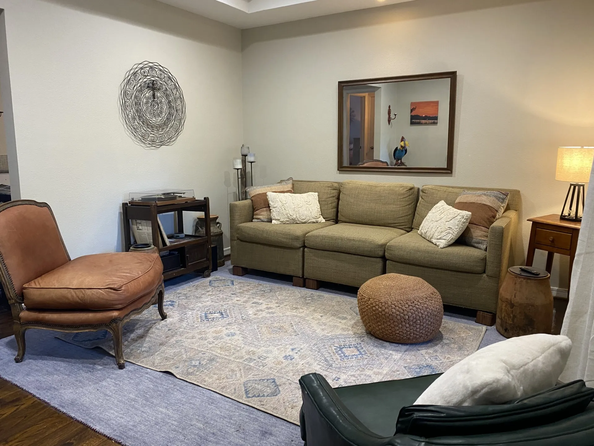 Recessed ceiling lighting, wood-finish flooring, and light wall paint