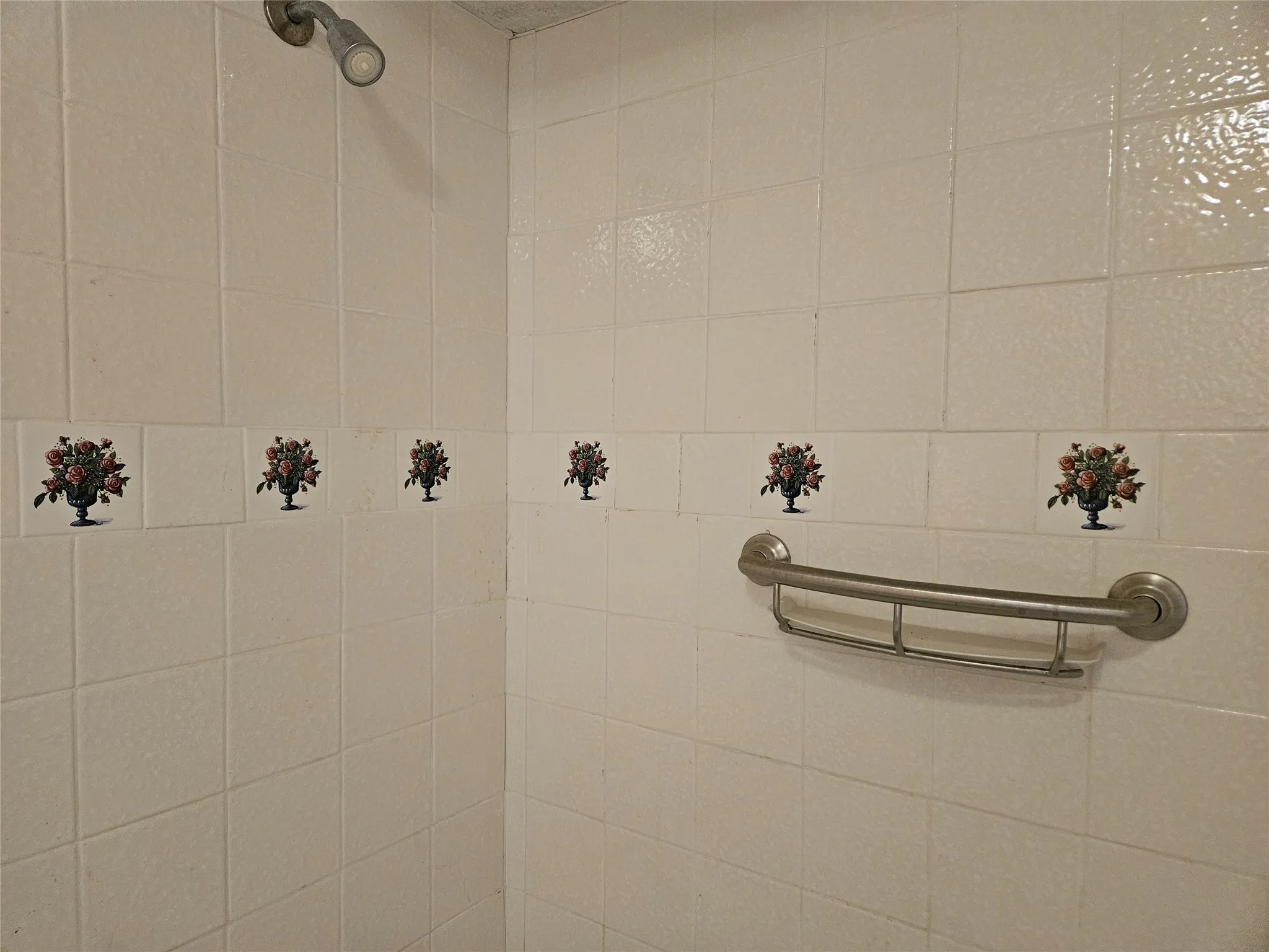 Bathroom view of tiled shower