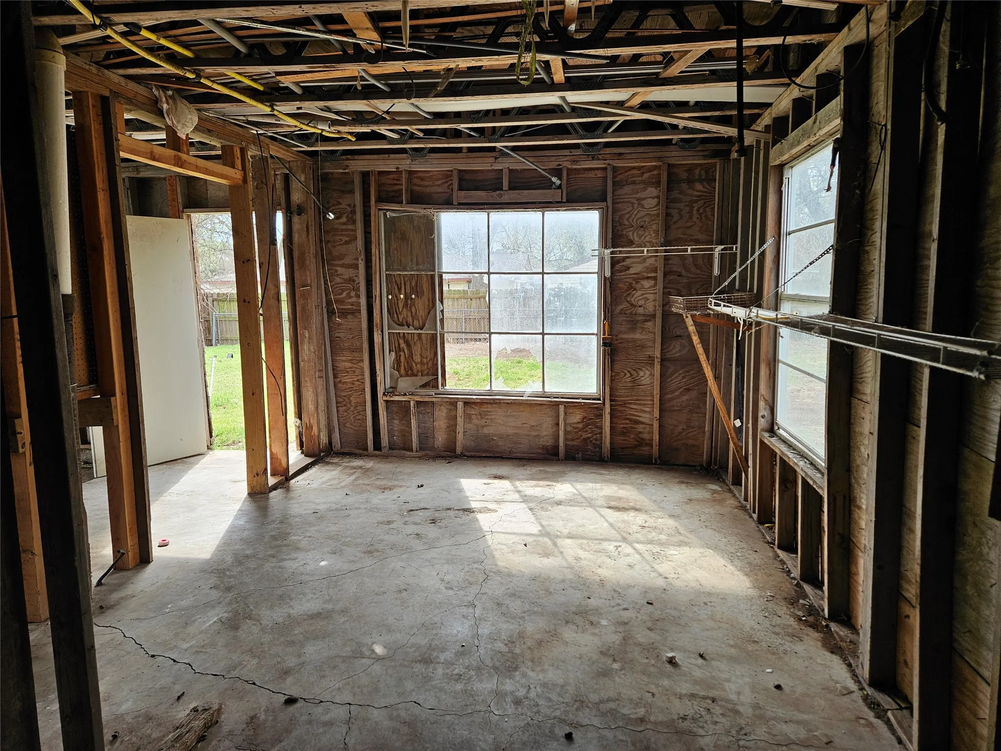 Misc room with healthy amount of natural light
