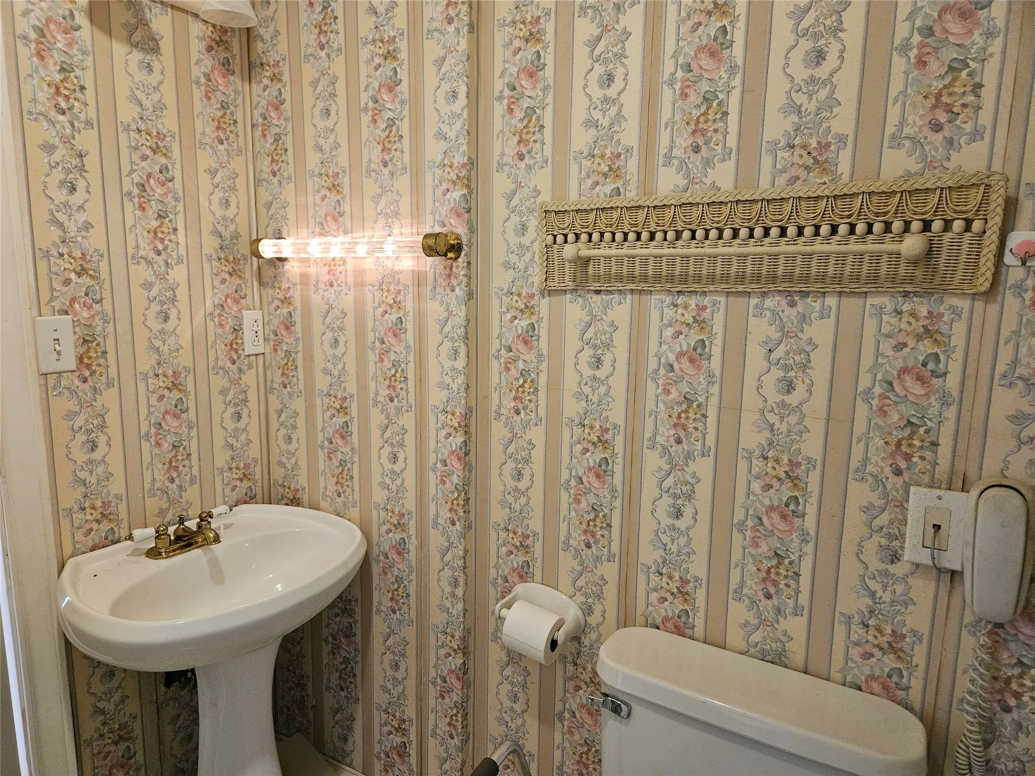 Half bath featuring toilet